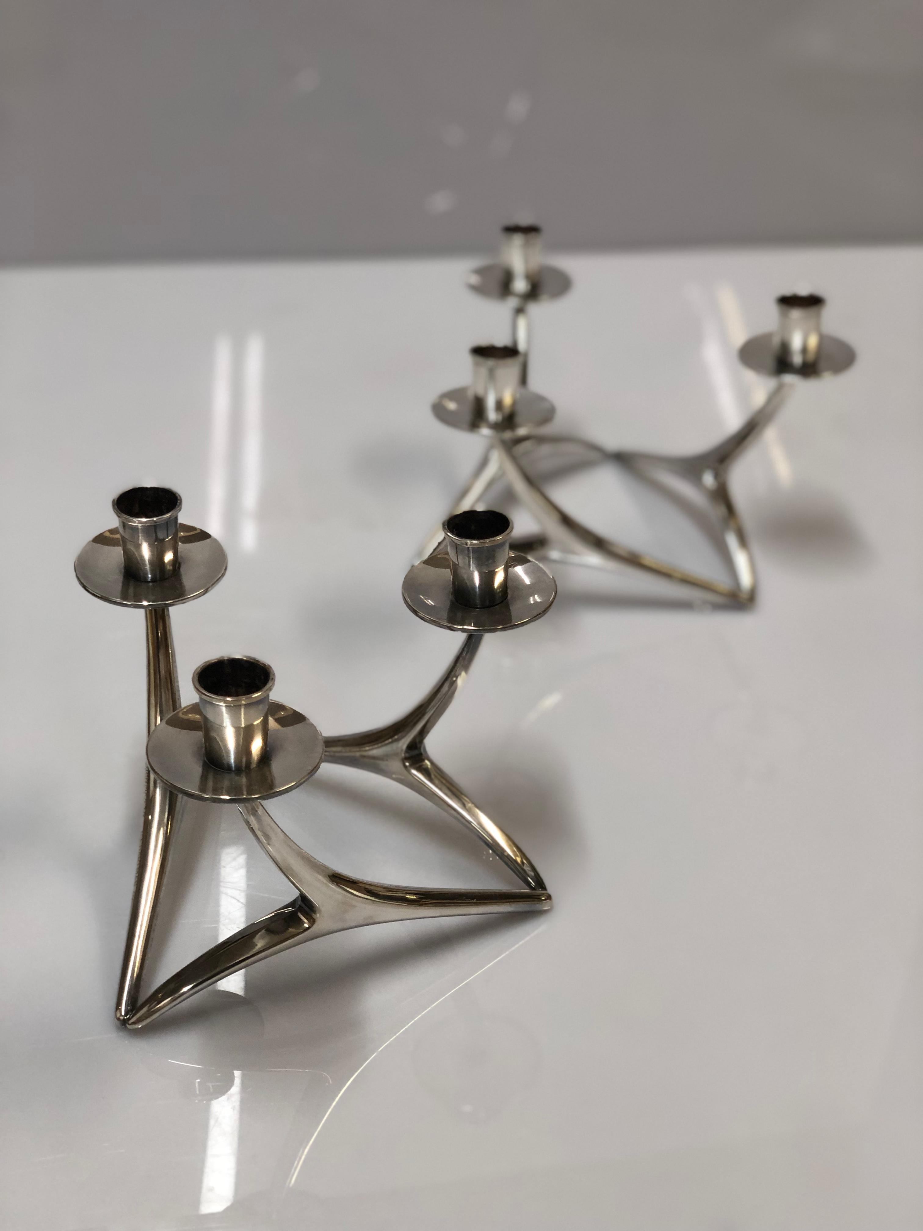 A set of 2 very beautiful candleholders designed by Anna Greta-Eker. These pieces are apart of a very well known series of candle holders in different sizes and shapes but in the same design by Anna Greta-Eker. These 2 in particular are amongst the