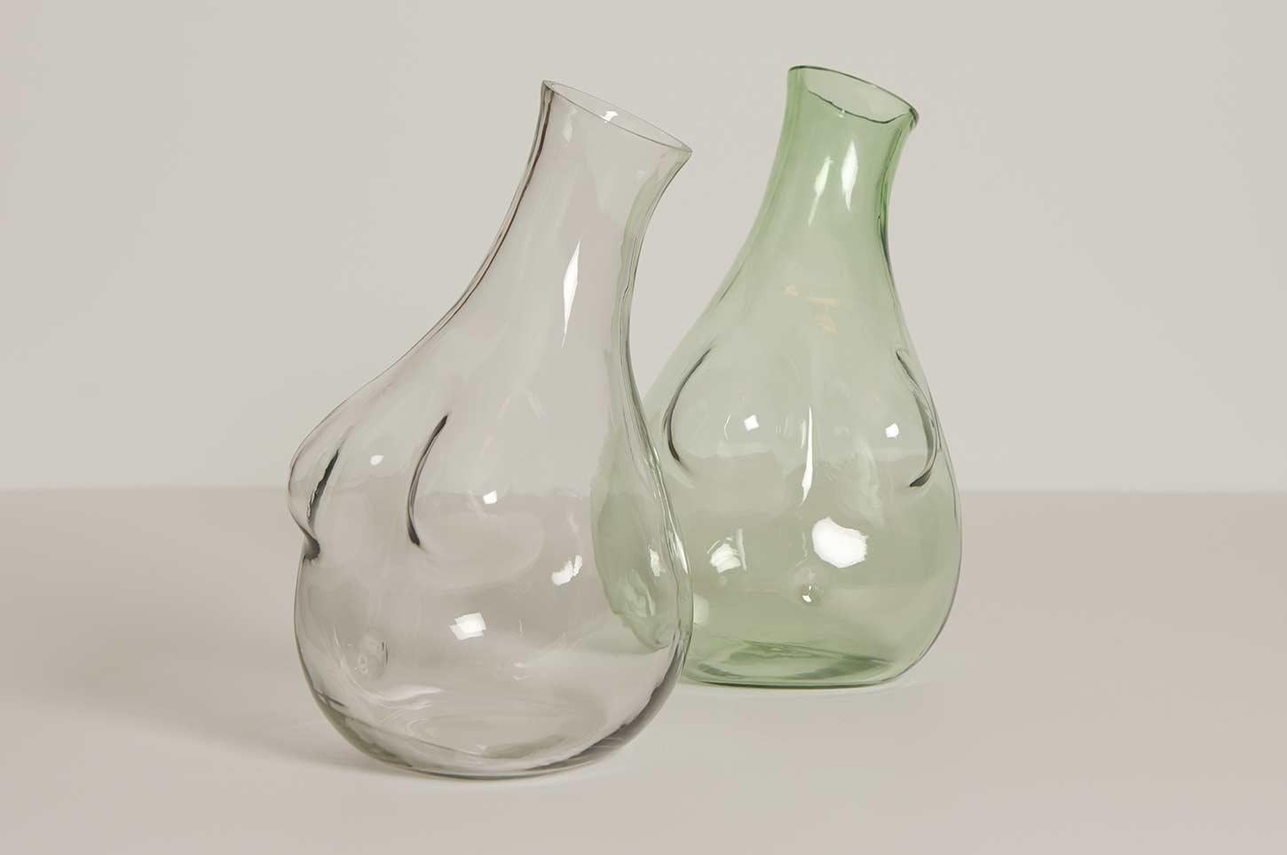 Made from hand-blown glass to hold water, wine or anything you else you fancy.

Capacity: 1750ml / 60 oz. When ordering, please specify clear or green glass.