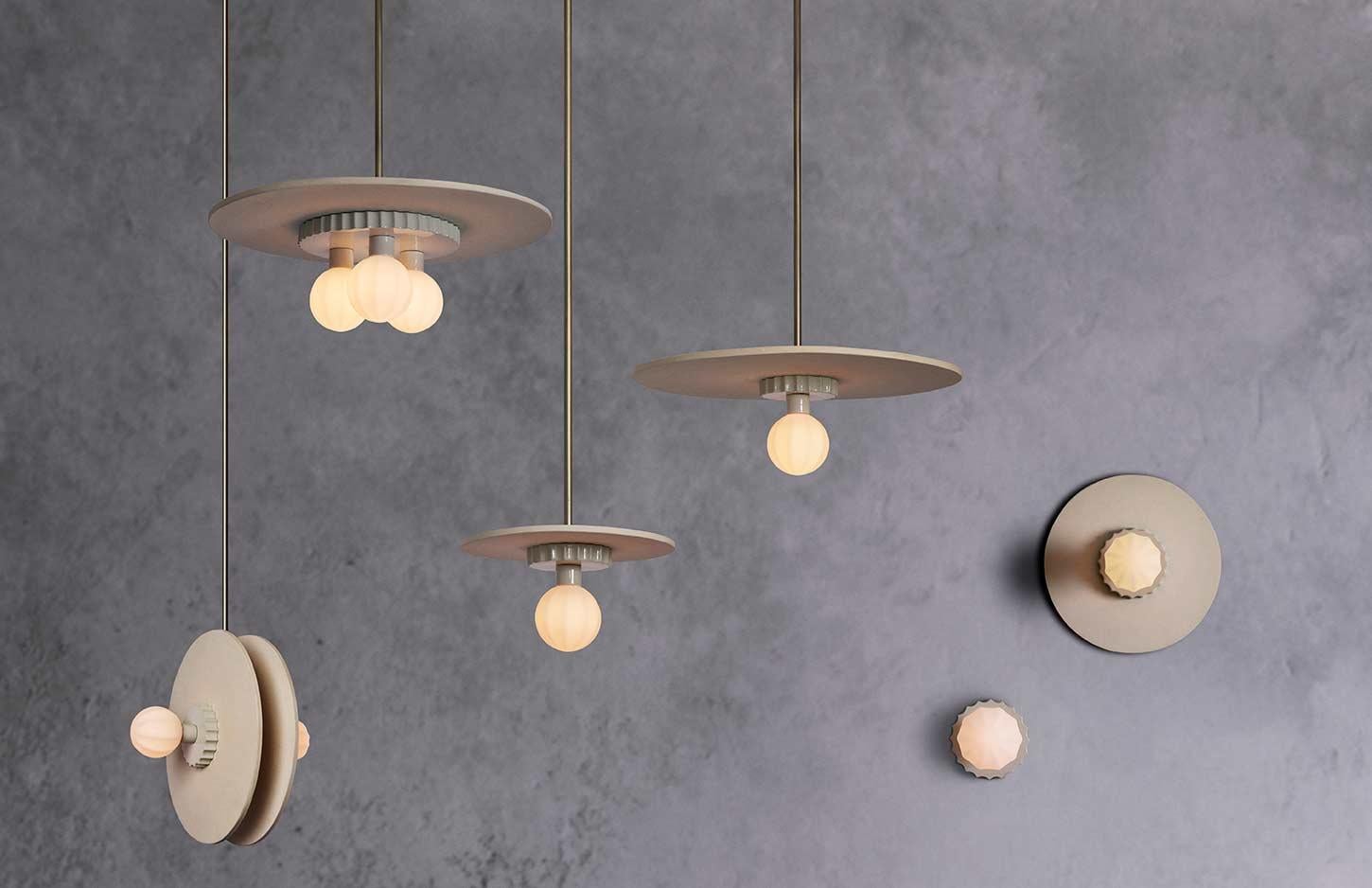 This family of lights are composed of hand-blown ridged glass, a scalloped glaze puck, and topped off with a large unglazed ceramic disc. The difference in texture between the elements are picked up beautifully by the light

Lamping: 1 G9 bulb,