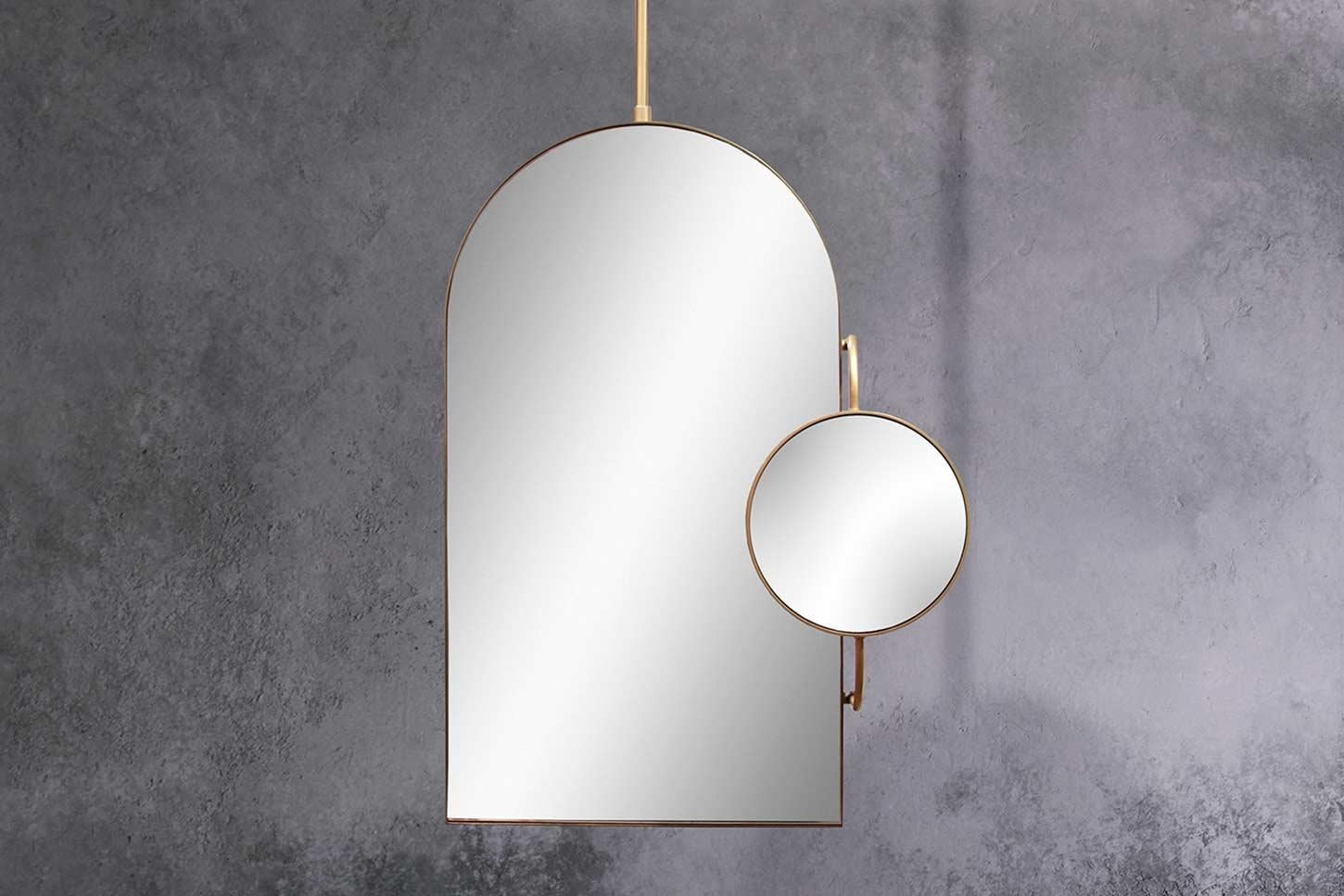 Made to hang from the ceiling, this sculptural piece has an articulated 5x magnifying side mirror.

Note: Mirror must be mounted to the wall as well as the ceiling. Please see Tear Sheet for details.

Materials: Steel, Brass and Mirror