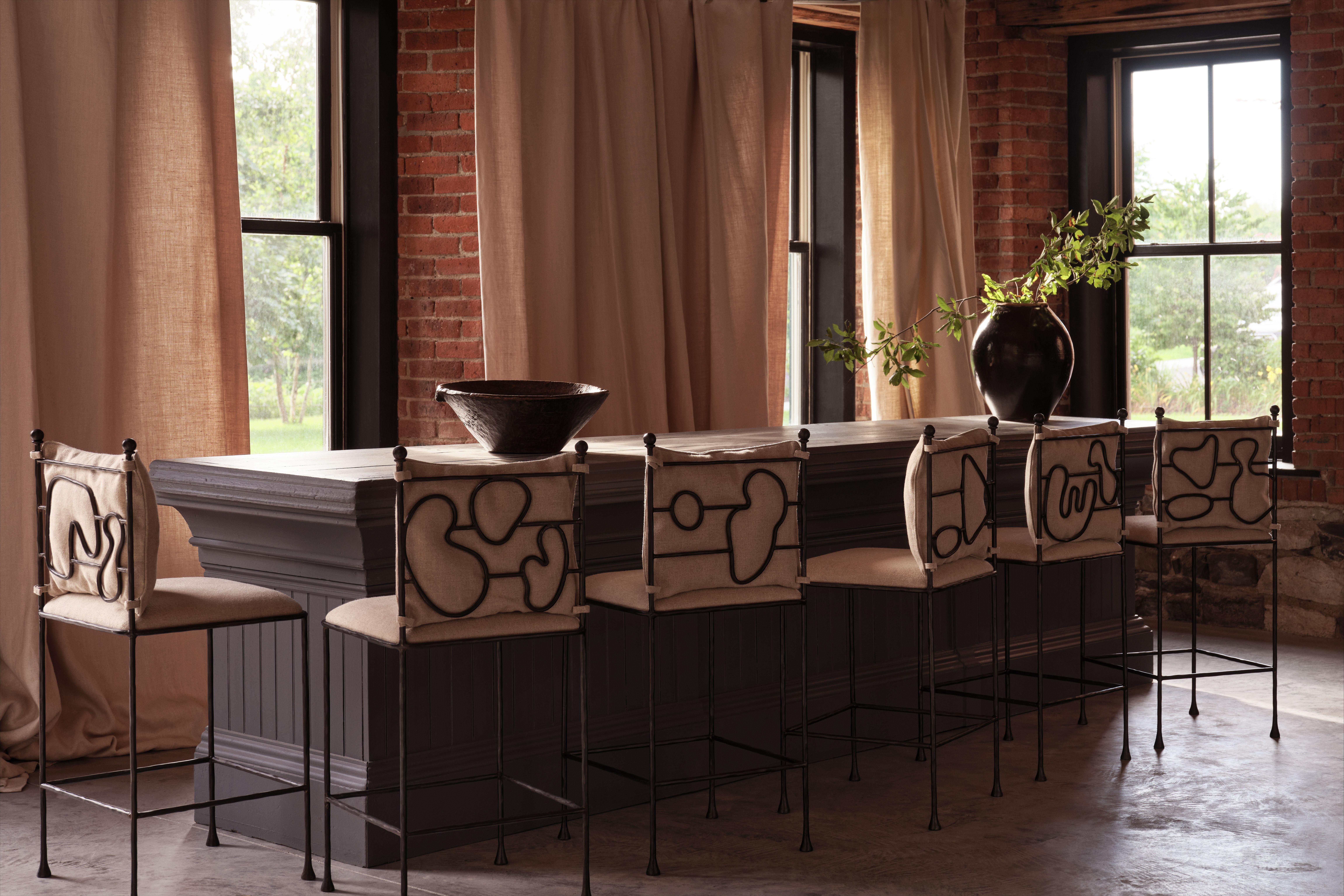 Each Wrought Iron Counter Stool has a unique composition wrought into the backrest. There are six shapes to choose from each with an upholstered seat cushion and removable back cushion to complete the design.

Materials: Wrought Iron +