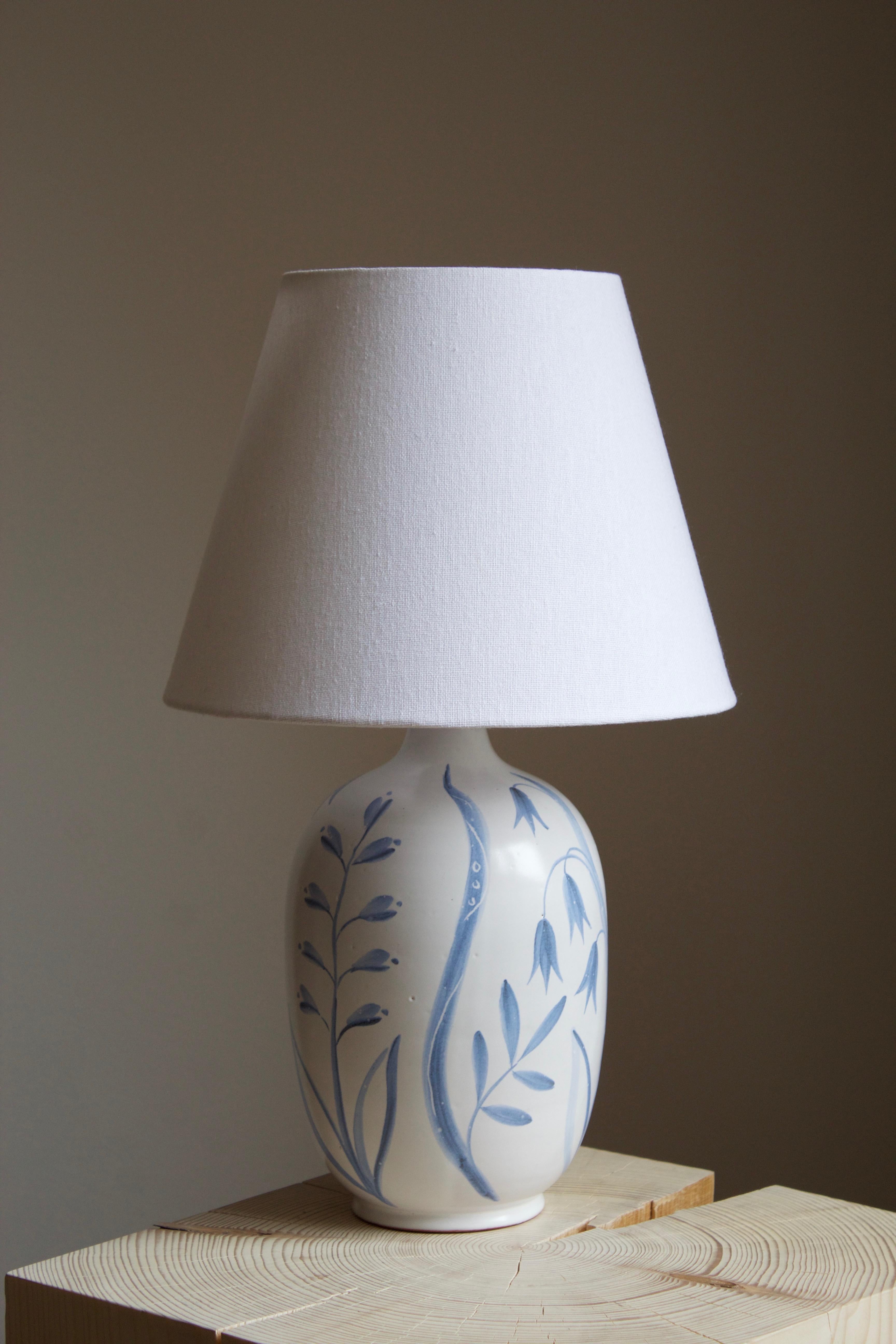 An early modernist table lamp model Flora. Designed by Anna-Lisa Thomson, for Upsala-Ekeby, Sweden. With stamp including artist's initials. Only produced in 1949.

Sold without lampshade. Stated dimensions excluding lampshade. Sold without