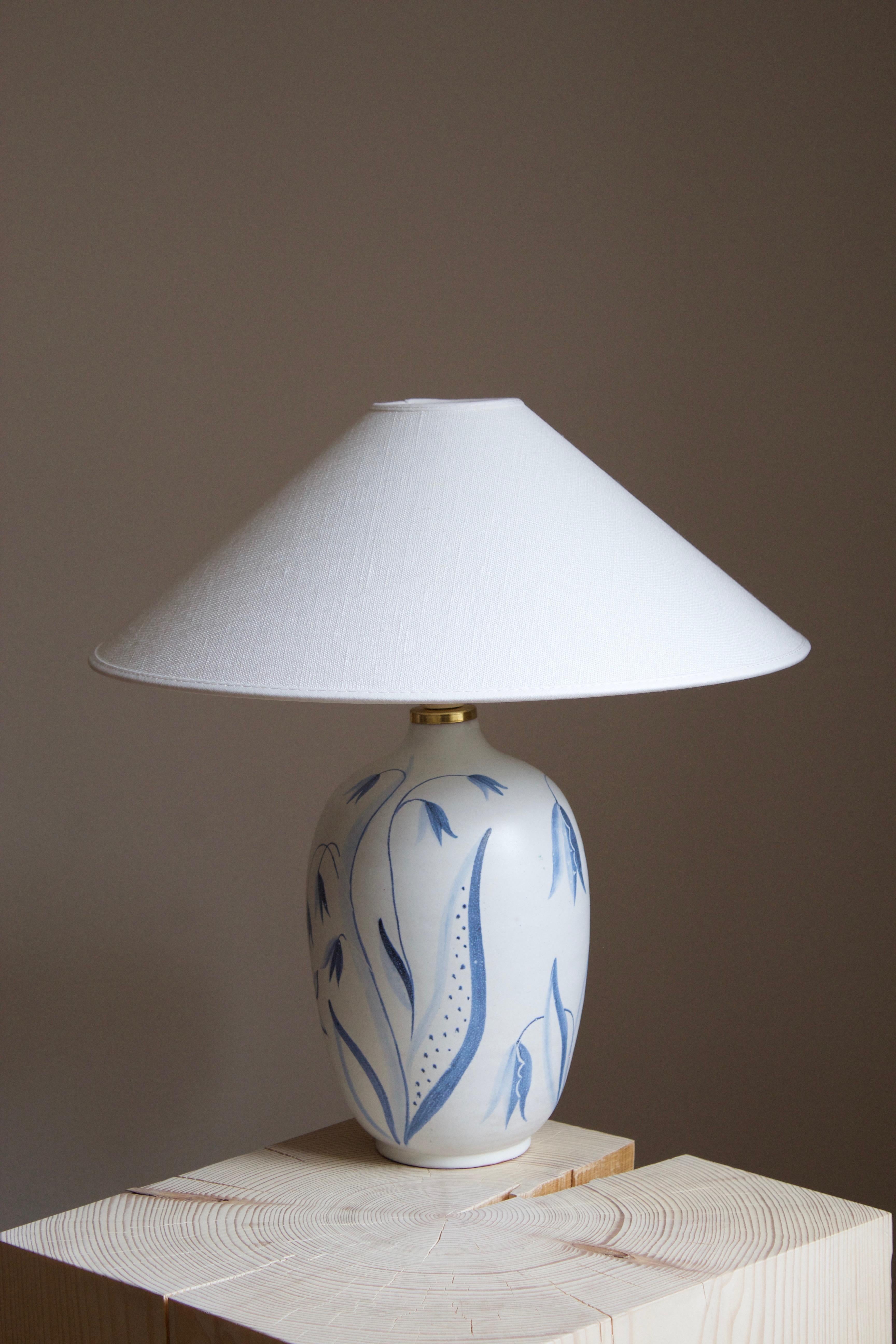 An early modernist table lamp model Flora. Designed by Anna-Lisa Thomson, for Upsala-Ekeby, Sweden. With stamp including artist's initials. Only produced in 1949.

Sold without lampshade. Stated dimensions excluding lampshade.

Other designers