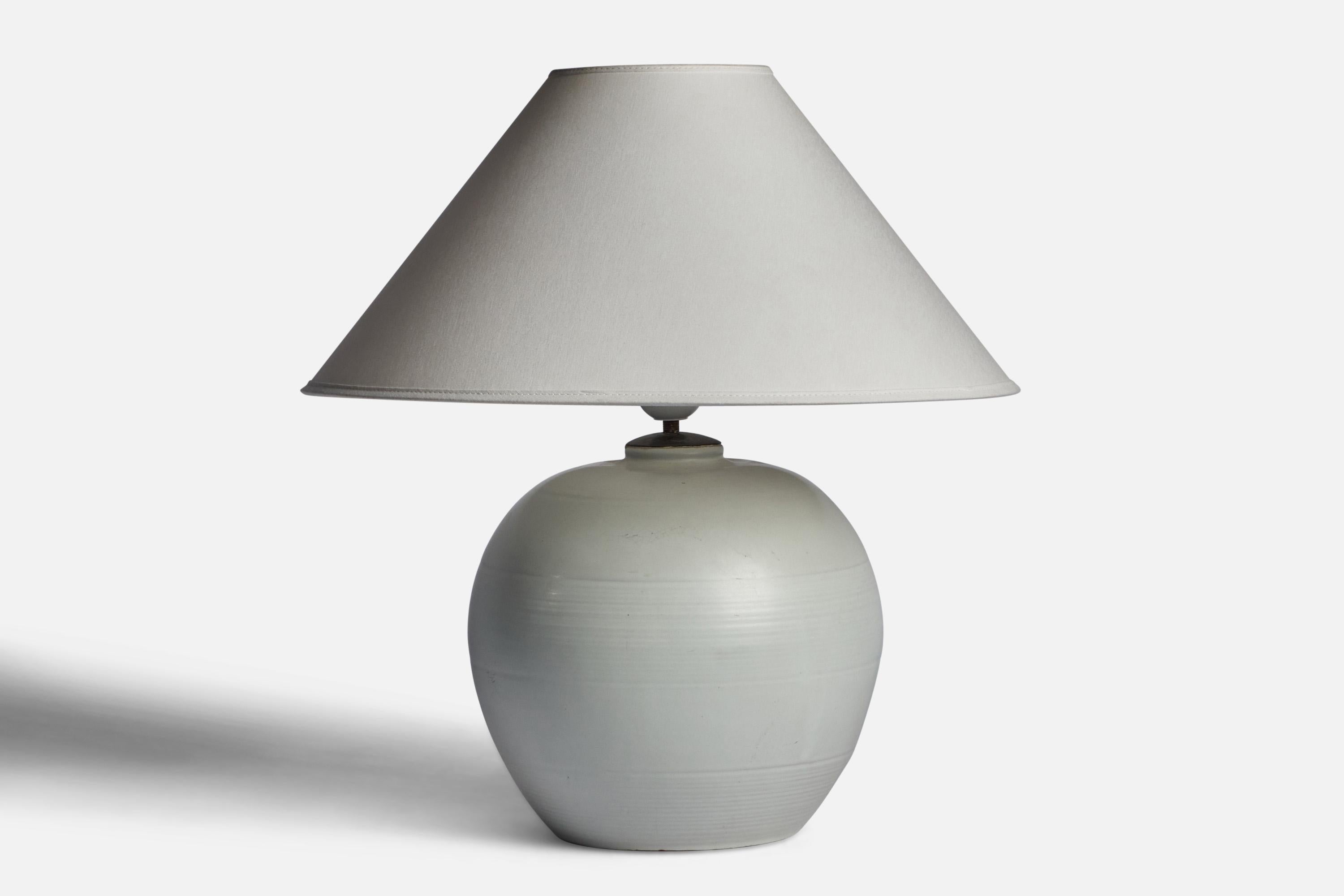 An off-white table lamp designed by Anna-Lisa Thomson and produced by Upsala Ekeby, Sweden, 1930s.

“EKEBY 3154” stamp on bottom

Dimensions of Lamp (inches): 12” H x 9.5” Diameter
Dimensions of Shade (inches): 4.5” Top Diameter x 15.75” Bottom