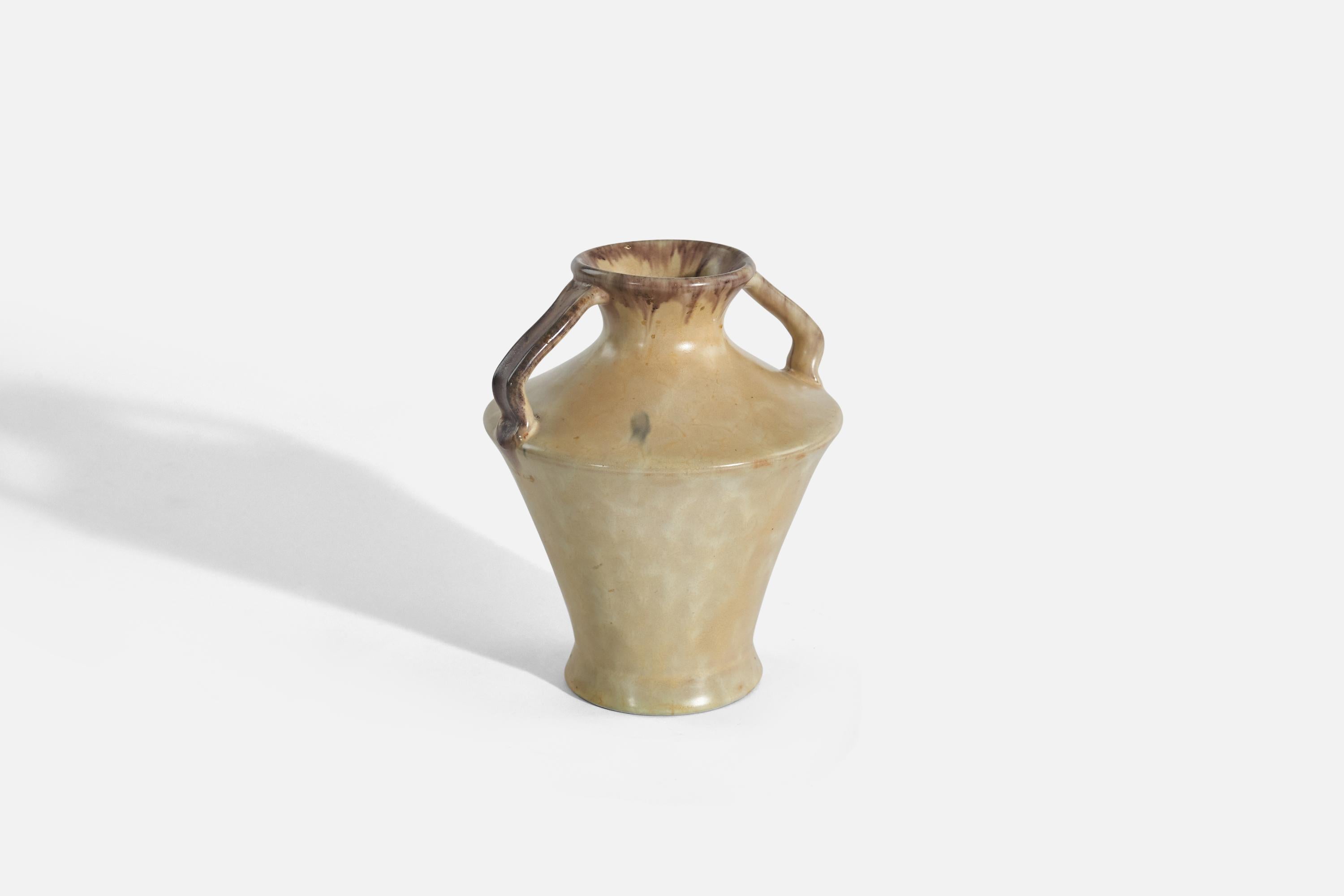 A beige-glazed earthenware vase designed by Anna-Lisa Thomson and produced by Upsala-Ekeby, Sweden, 1936-1938.

