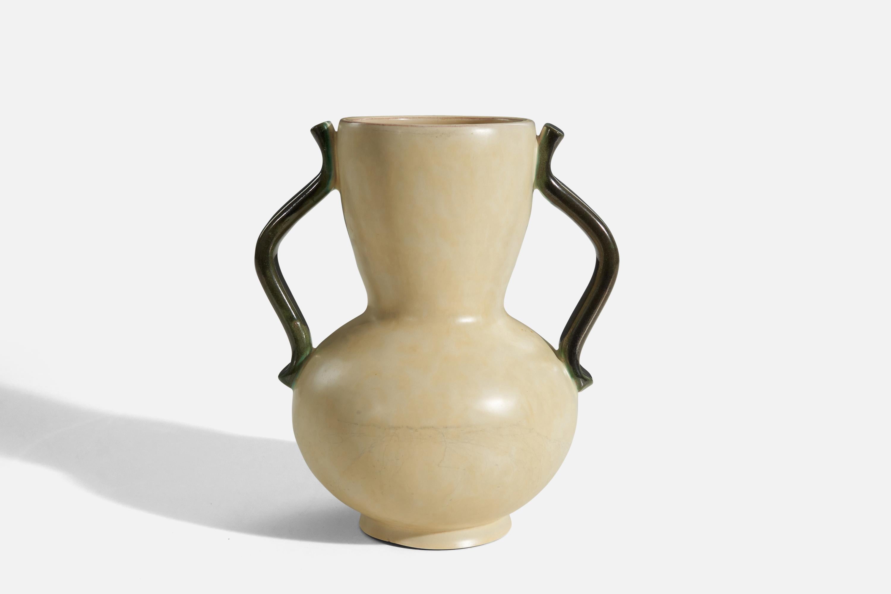 A beige and green-glazed earthenware vase designed by Anna-Lisa Thomson, for Upsala-Ekeby, Sweden, 1940s. 

