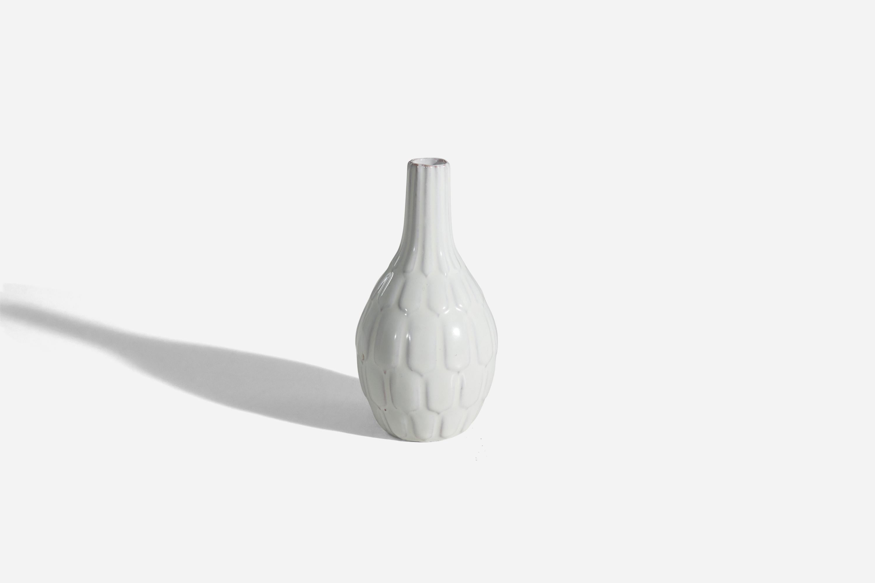 A white earthenware vase, 