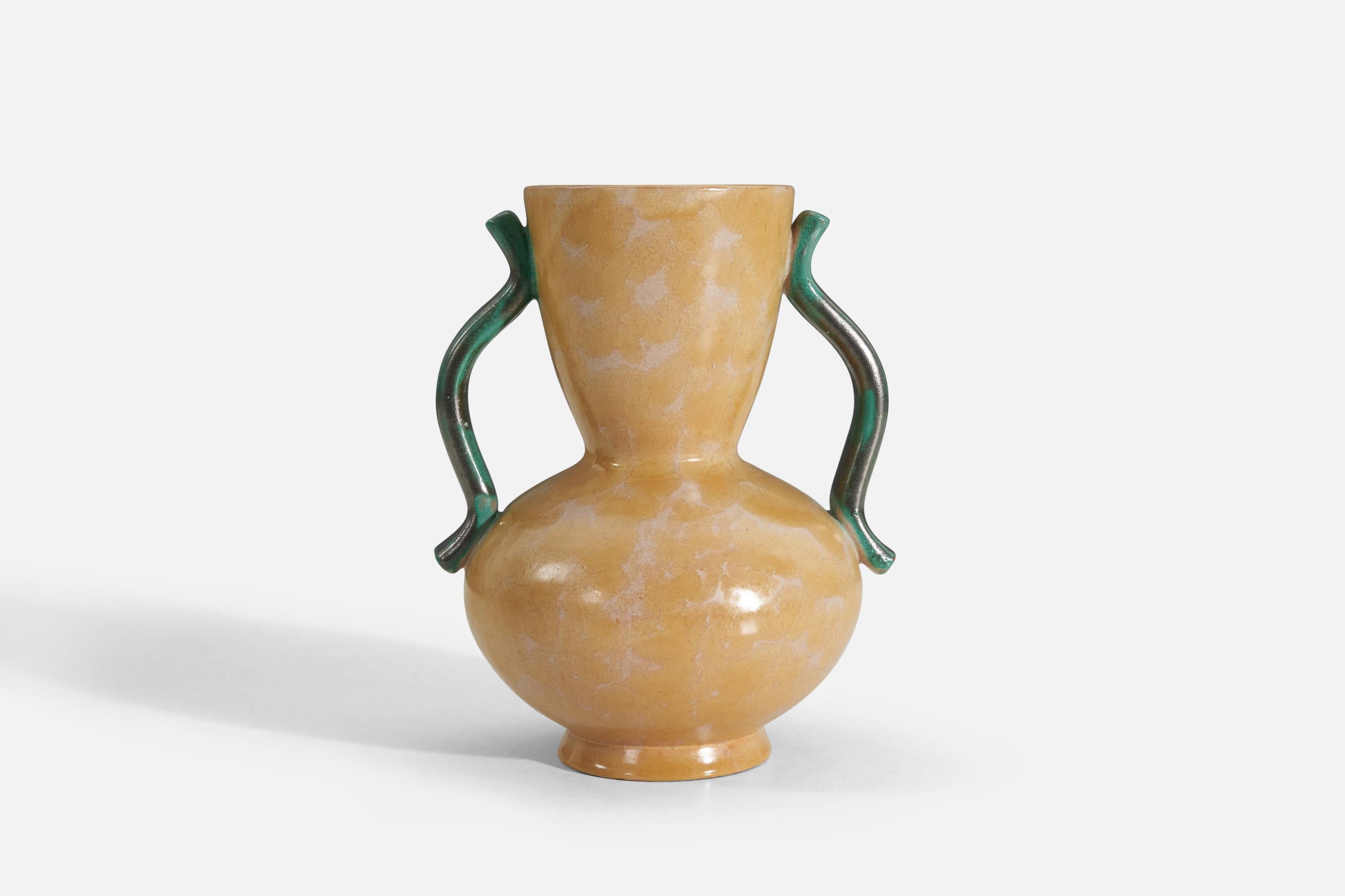 A yellow glazed vase with green handles designed by Anna-Lisa Thomson, for Upsala-Ekeby, Sweden, 1940s.

