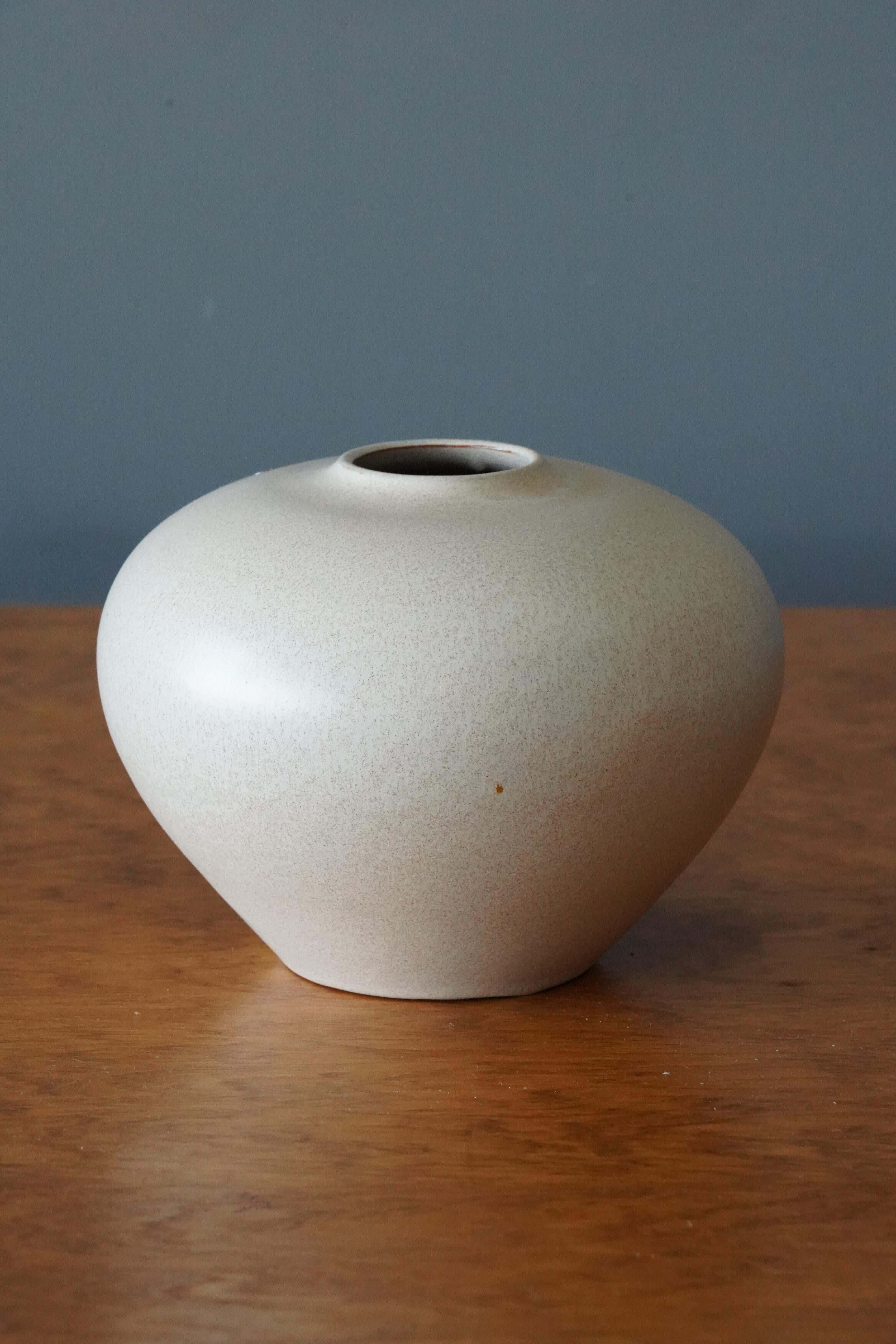 An early modernist vase. Designed by Anna-Lisa Thomson, for Upsala-Ekeby, Sweden, 1940s. Labeled.

Other designers of the period include Ettore Sottsass, Carl Harry Stålhane, Lisa Larsson, Axel Salto, and Arne Bang.
