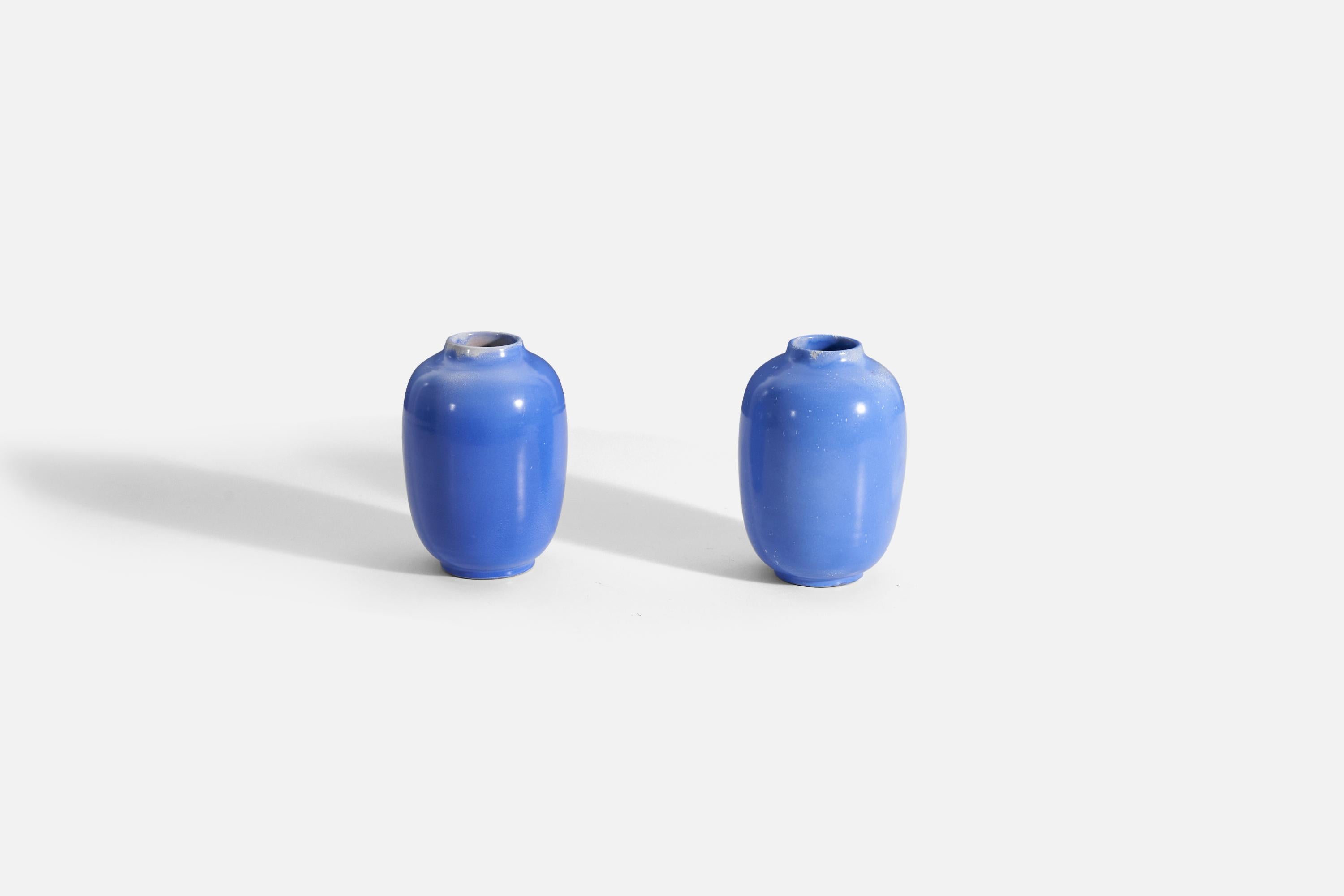 A pair of blue-glazed earthenware vases designed by Anna-Lisa Thomson, for Upsala-Ekeby, Sweden, 1940s. Stamped to underside.

.