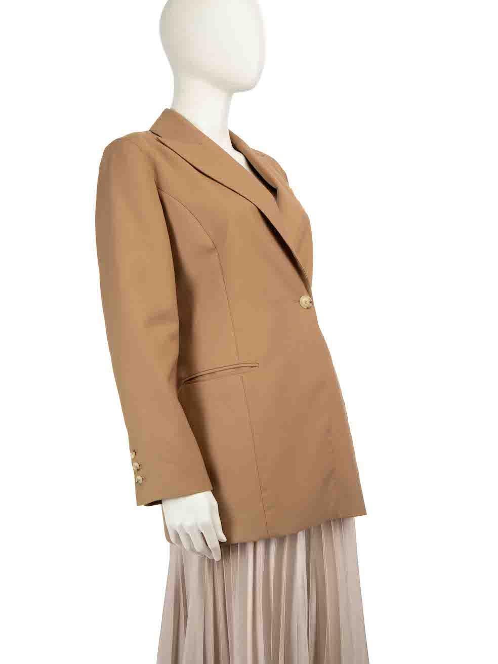 CONDITION is Very good. Hardly any visible wear to the blazer is evident on this used ANNA QUAN designer resale item.
 
 
 
 Details
 
 
 Brown
 
 Polyester
 
 Blazer jacket
 
 Mid length
 
 Shoulder pads
 
 Button up fastening
 
 Long sleeves
 
