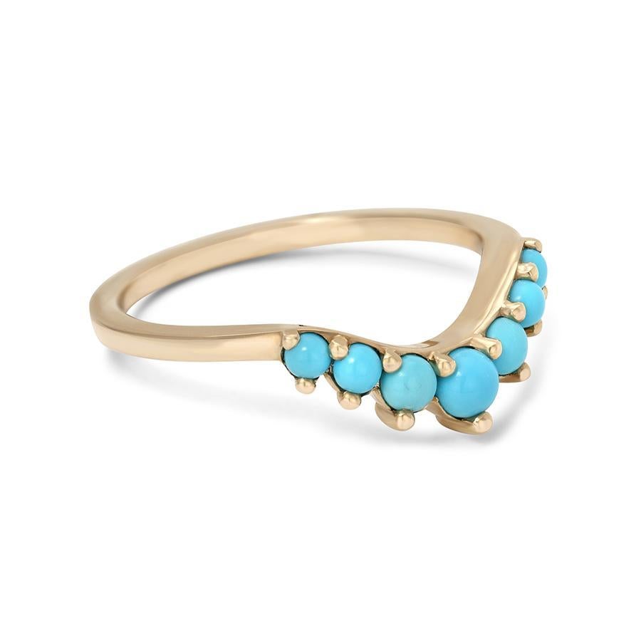 Turquoise stones set in recycled 14k yellow, rose, or white gold.

New to our signature Tiara collection, the celestially inspired Cosmic Tiara Band’s subtle curve is composed of seven supersized, round turquoise gemstones—a delightful dose of
