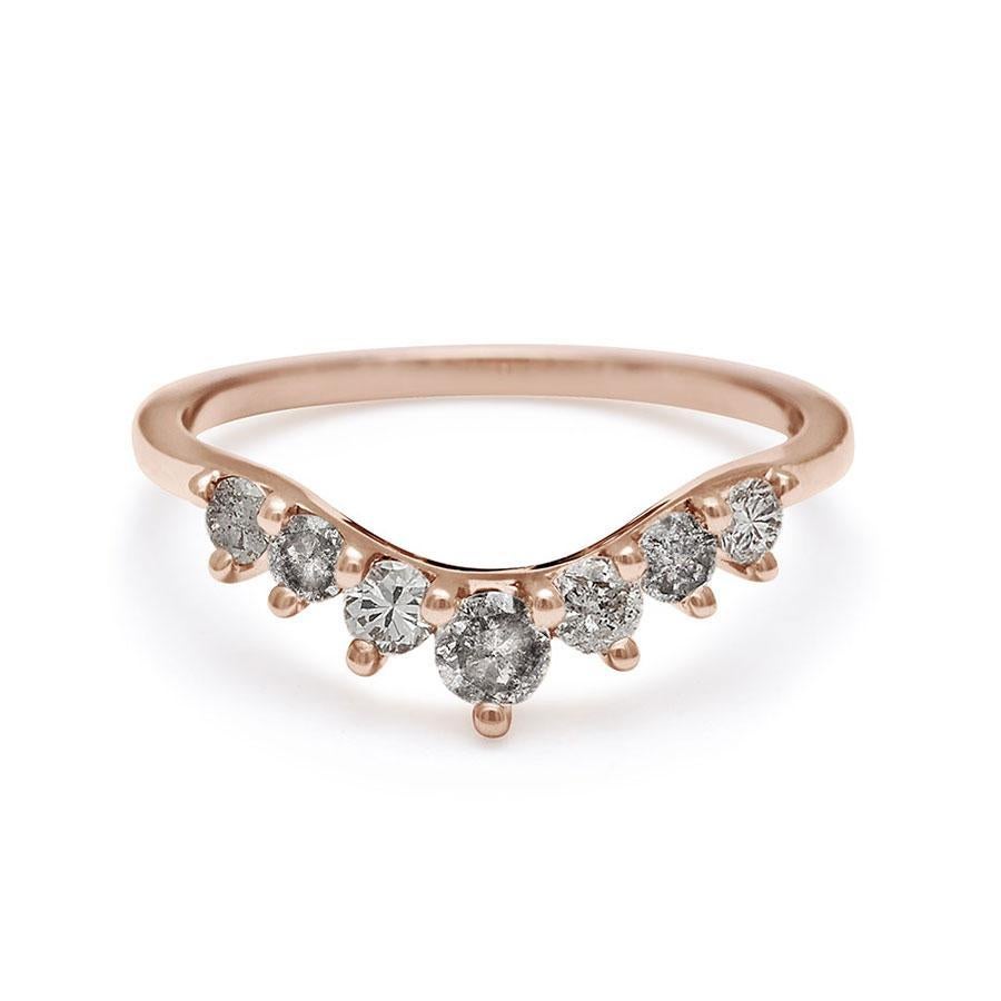 0.40ctw grey diamonds set in recycled 14k yellow, rose, or white gold. Made in New York City.

New to our signature Tiara collection, the celestially inspired Cosmic Tiara Band’s subtle curve is composed of seven supersized, round diamonds—a