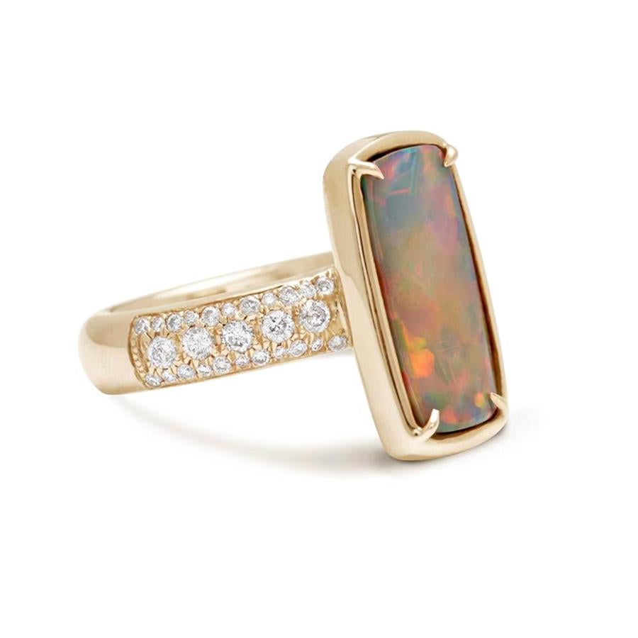10x18mm Black opal, 0.49ctw grey diamond pavé, 14k yellow gold.

This stunning one of a kind Eleonore ring features a black opal center stone set in 14k yellow gold with claw-shape prongs. Three rows of micro-pavè grey diamonds on along the top and