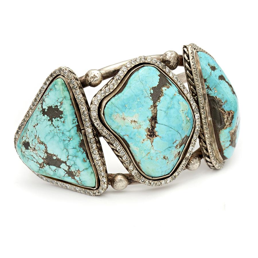 The diamond dusted Three Stone Turquoise Cuff features 3.74ctw reclaimed grey diamonds set in sterling silver.

This Heritage piece is an offering exclusive to the Anna Sheffield store comprised of luxe, diamond-dusted, silver and gold vintage as