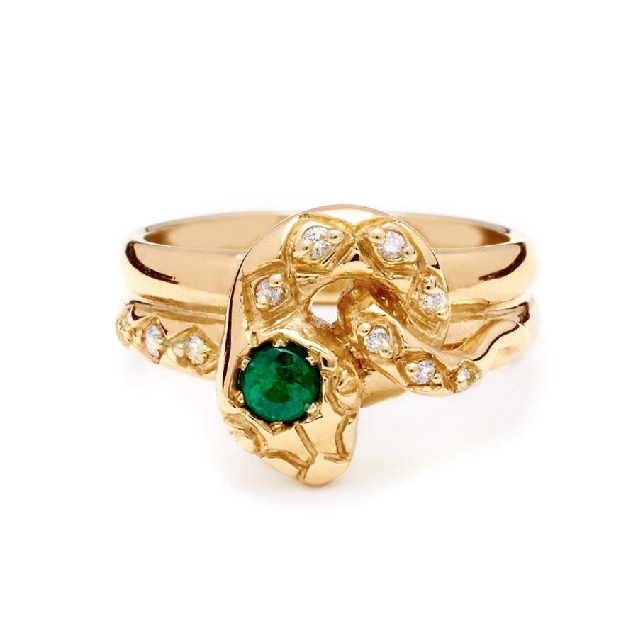 This suite includes our Victorian Serpent Ring: 3mm emerald and 0.15ctw white diamonds, in 14k yellow gold. And our Serpent Band: with white diamond accents, in 14k yellow gold.

Each emerald is unique and may vary in appearance from what is