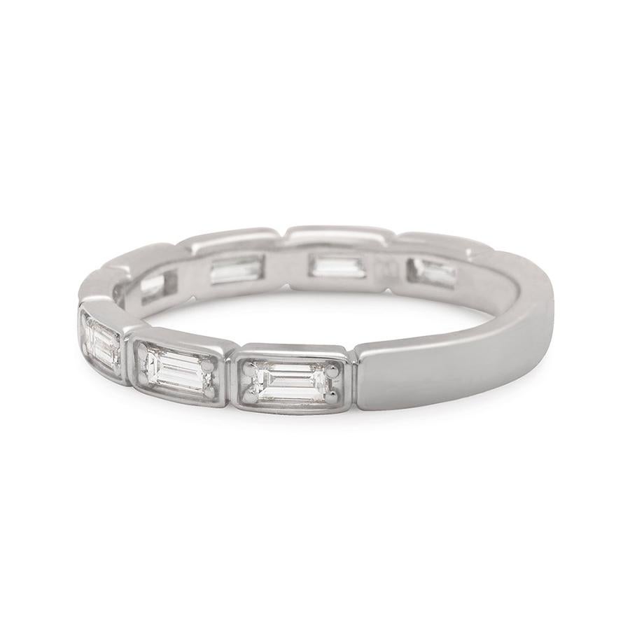 Approximately .50ctw white diamond baguettes set in 14k recycled white, rose, or yellow gold.

Equal parts timeless and uniquely modern, the Wheat Half Eternity band is a stunning new addition to the collection, featuring channel set baguettes