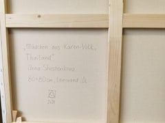 Girl from the Karen people. Portrait of a child. National costume.