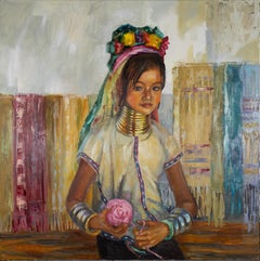 Girl from the Karen people. Portrait of a child. National costume.