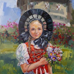 In The Rose Garden. Liechtenstein. Portrait of a girl in the traditional dress