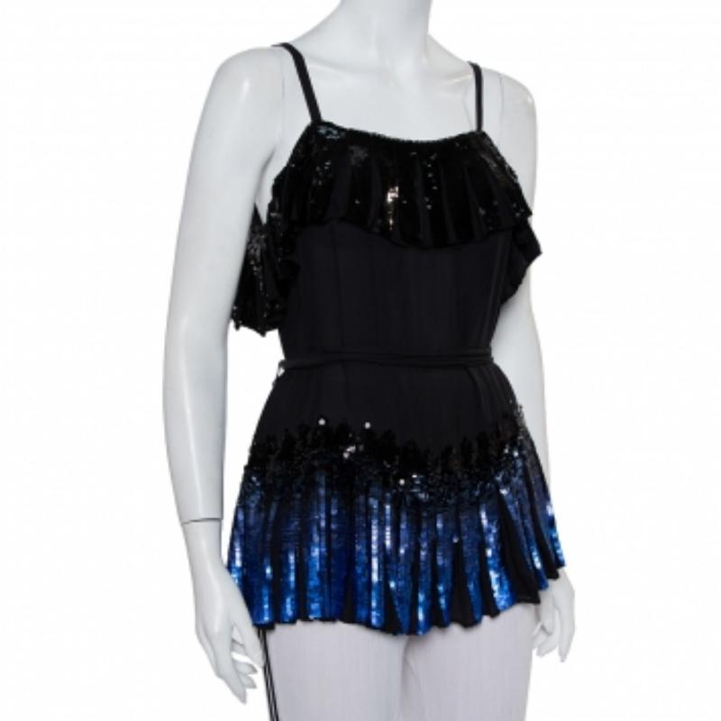 Perfect for night-time events and parties, this Anna Sui top will shine bright under the evening lights. It has been crafted from luxurious silk and embellished with dazzling sequins. The sleeveless top has pleat detailing, a belt that cinches the