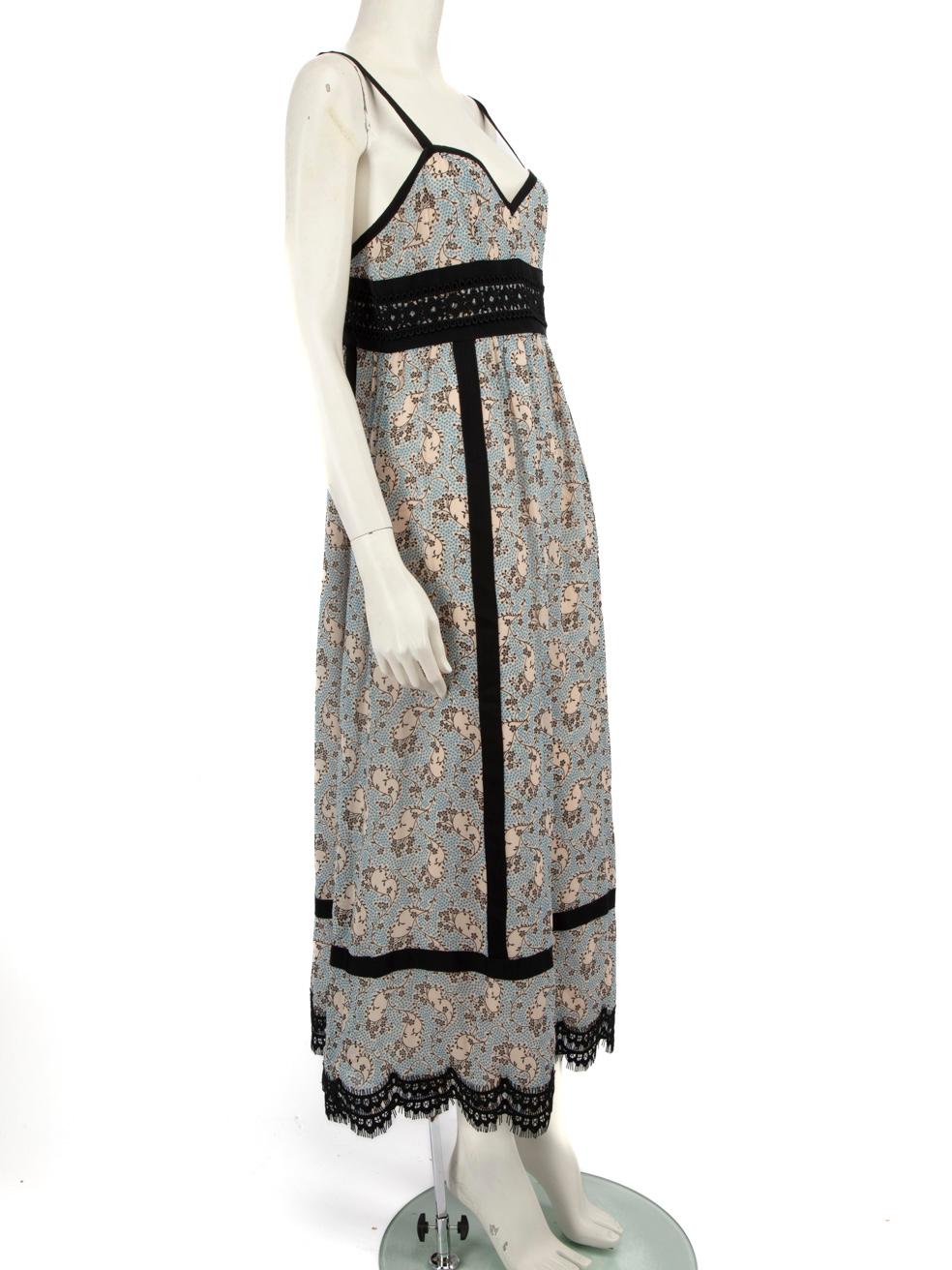 CONDITION is Very good. Minimal wear to the dress is evident. One pluck to the weave on the lower back of this used Anna Sui designer resale item.
  
  
  
  Details
  
  
  Multicolour- Blue and black
  
  Silk
  
  Midi dress
  
  Floral pattern
 