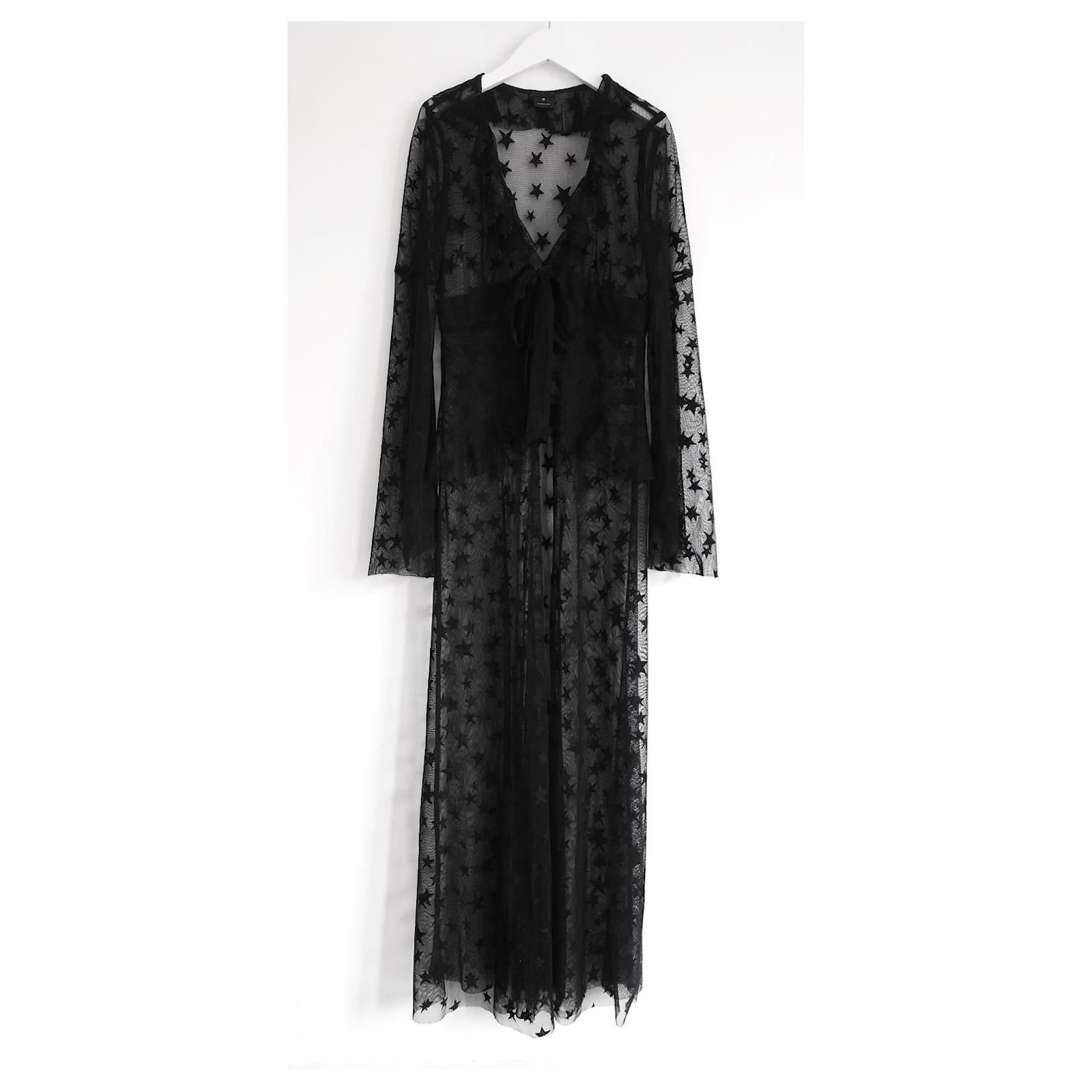 Abrigo luminoso de tul con forma de estrella fugaz de Anna Sui. comprado por 390 £ y usado una vez. Confeccionado en tul de nailon negro supersuave con diseño de estrellas, tiene mangas fluidas partidas, volantes delanteros y lazos de línea imperio