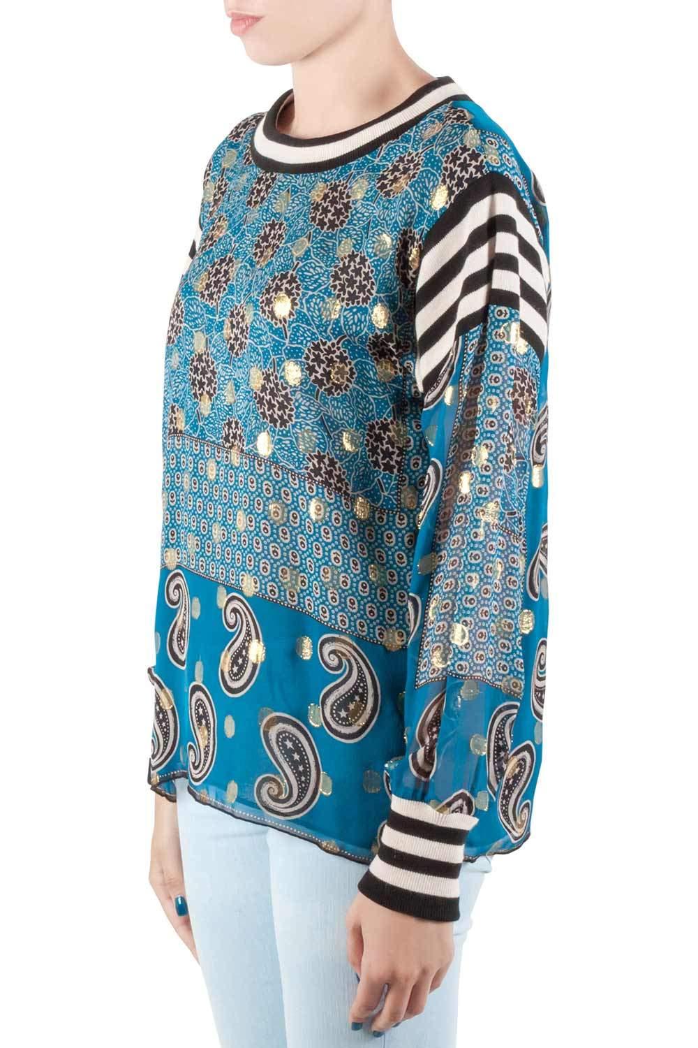 Look smart with this stunning top from Anna Sui that offers the finest of this season's trends. This teal blue creation is tailored in a silk blend featuring a bouquet scarf print all over, long sleeves and a round neckline. 