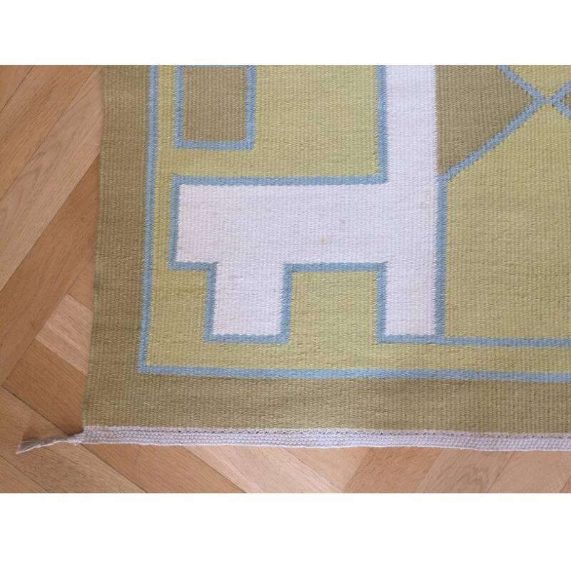 Unique handwoven carpet with geometric pattern in yellow, green, blue and white wool.
Measures: L 187 cm, W 148 cm.

Anna Thommesen is a self-taught Danish painter and weaver. Already during the 1940s, the weaving became the primary way she