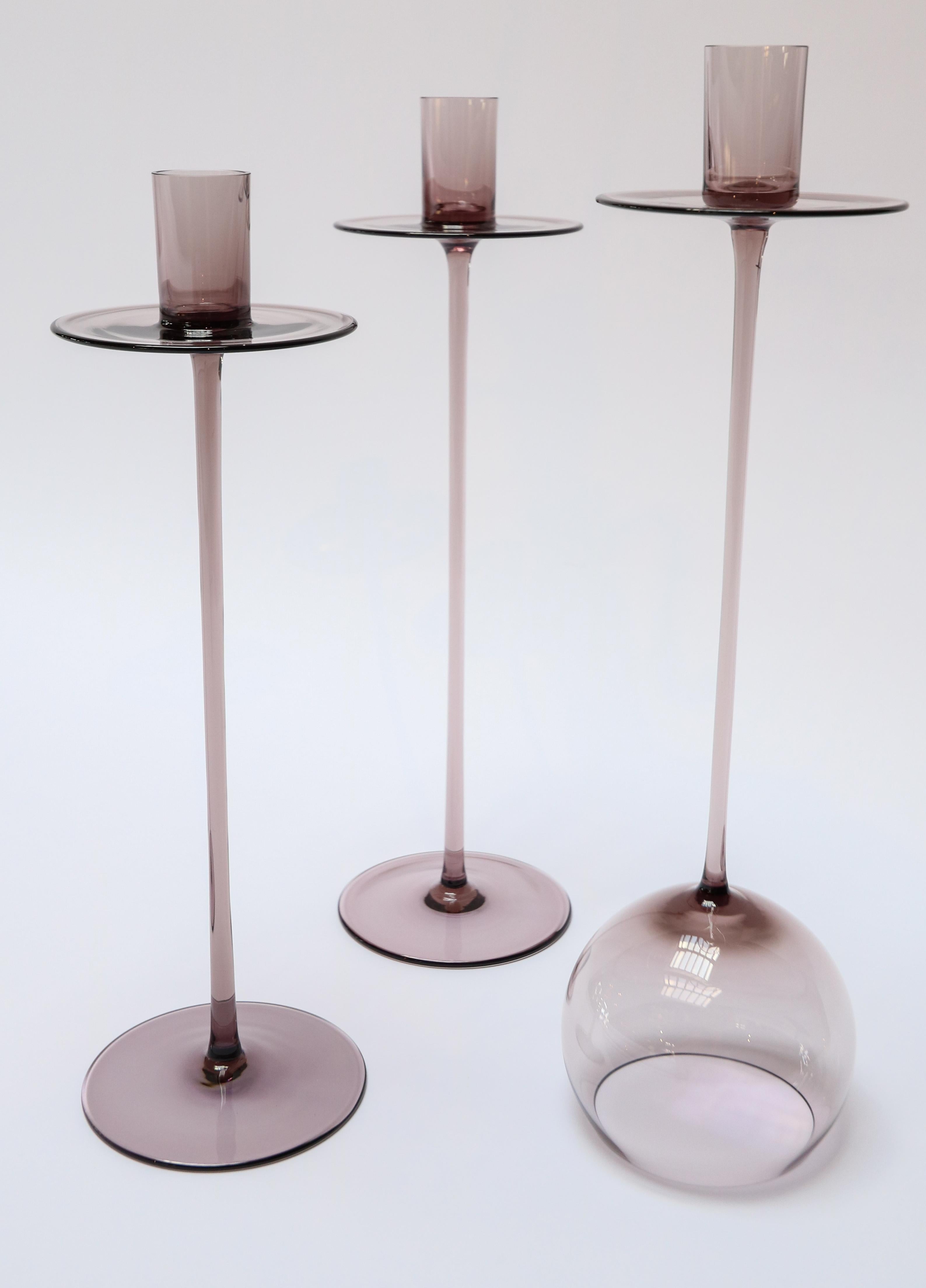 Anna Torfs Tilo glass candlesticks in plum. Available in other colors. Priced individually.

Measures: Tilo candlesticks low (12.75
