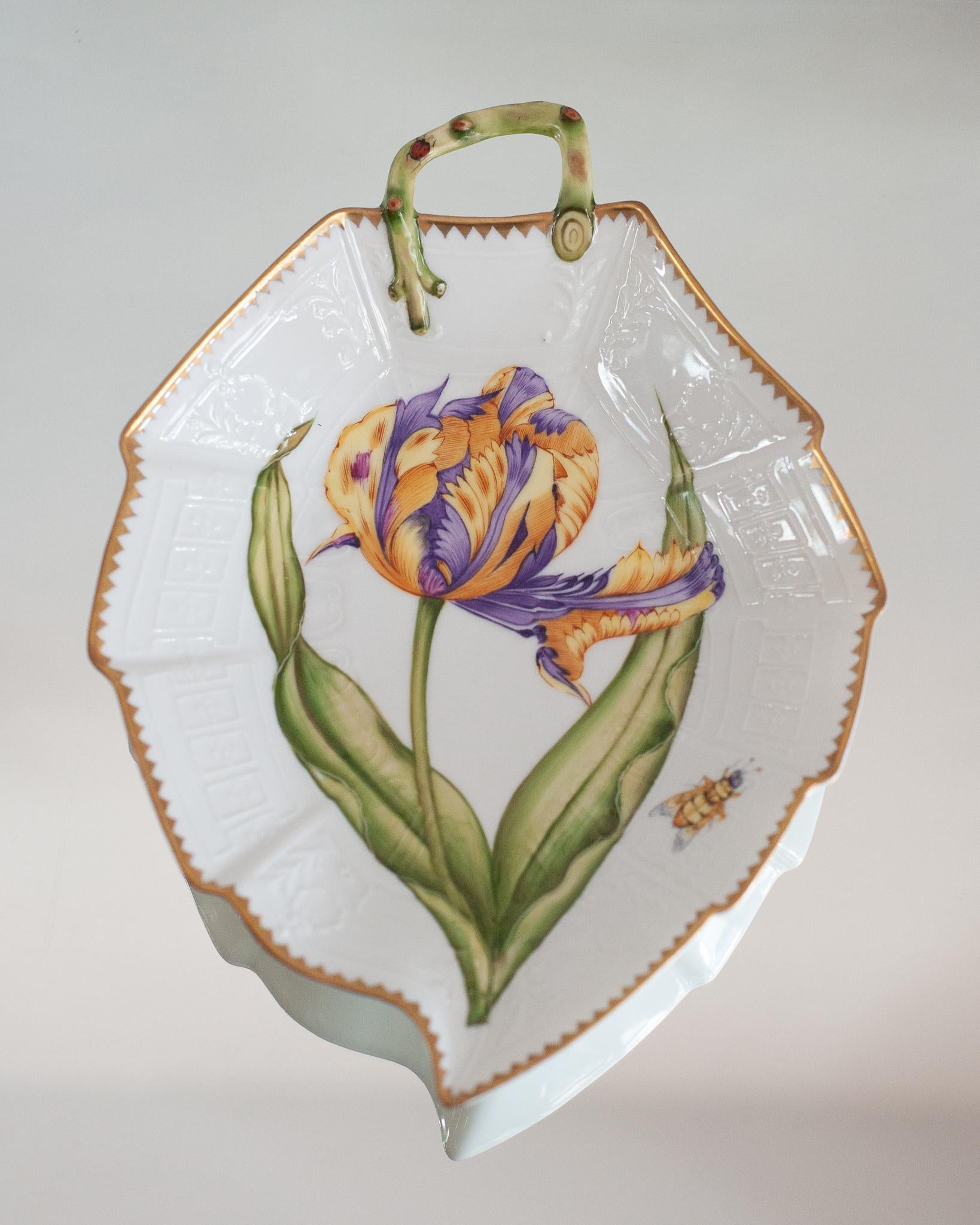 A beautiful hand painted leaf-shaped serving tray with handle, by Anna Weatherley Designs. Anna Weatherley has been designing and producing Fine Botanical Hand Painted Porcelain in Hungary for 30 years.