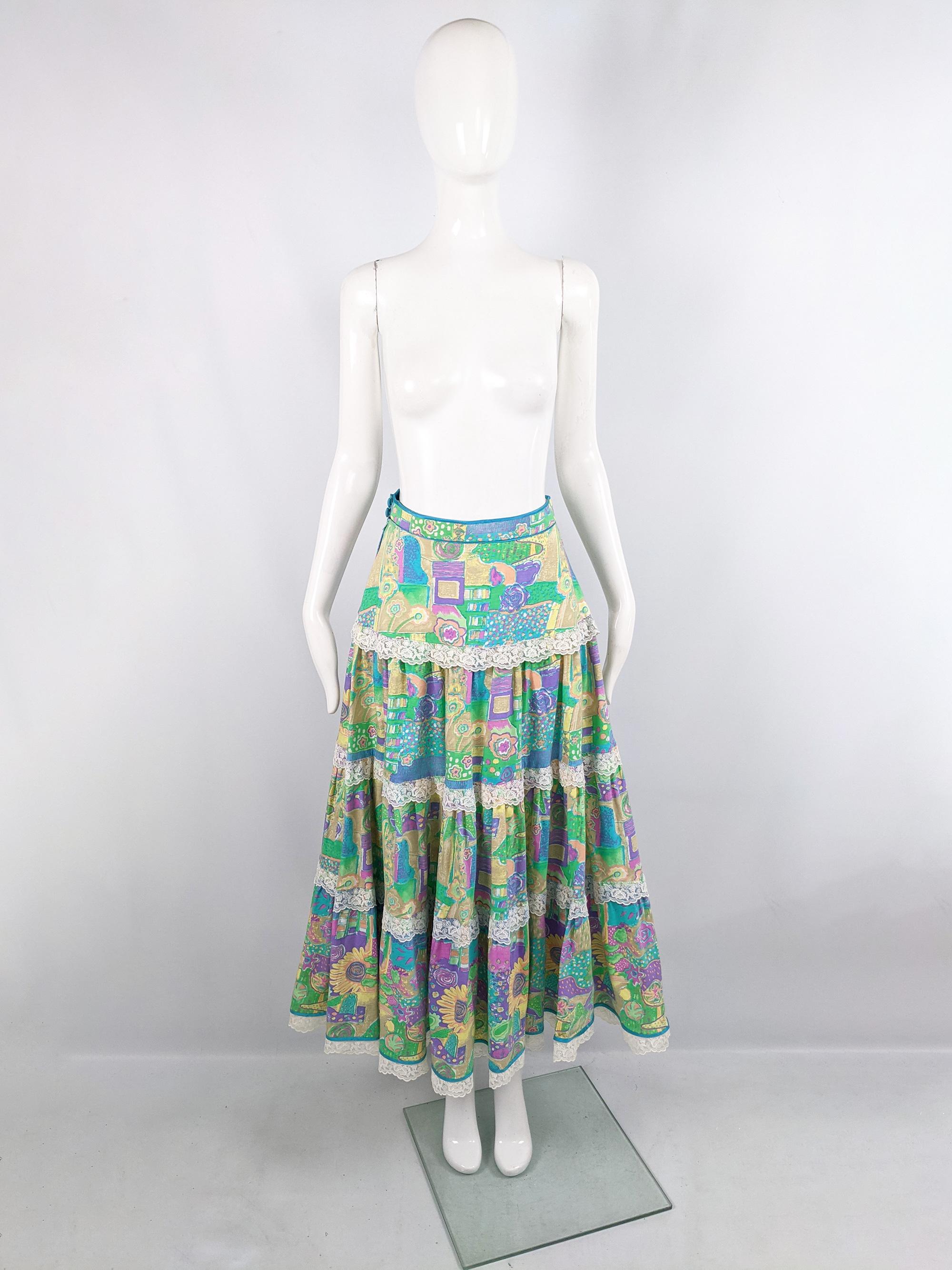 An amazing vintage bohemian womens maxi skirt from the 70s by iconic British designer, Annabelinda. In a cotton knit with a vibrant expressionist style print throughout and a lace trimmed, tiered design. 

Size:  Unlabelled; measures roughly like a