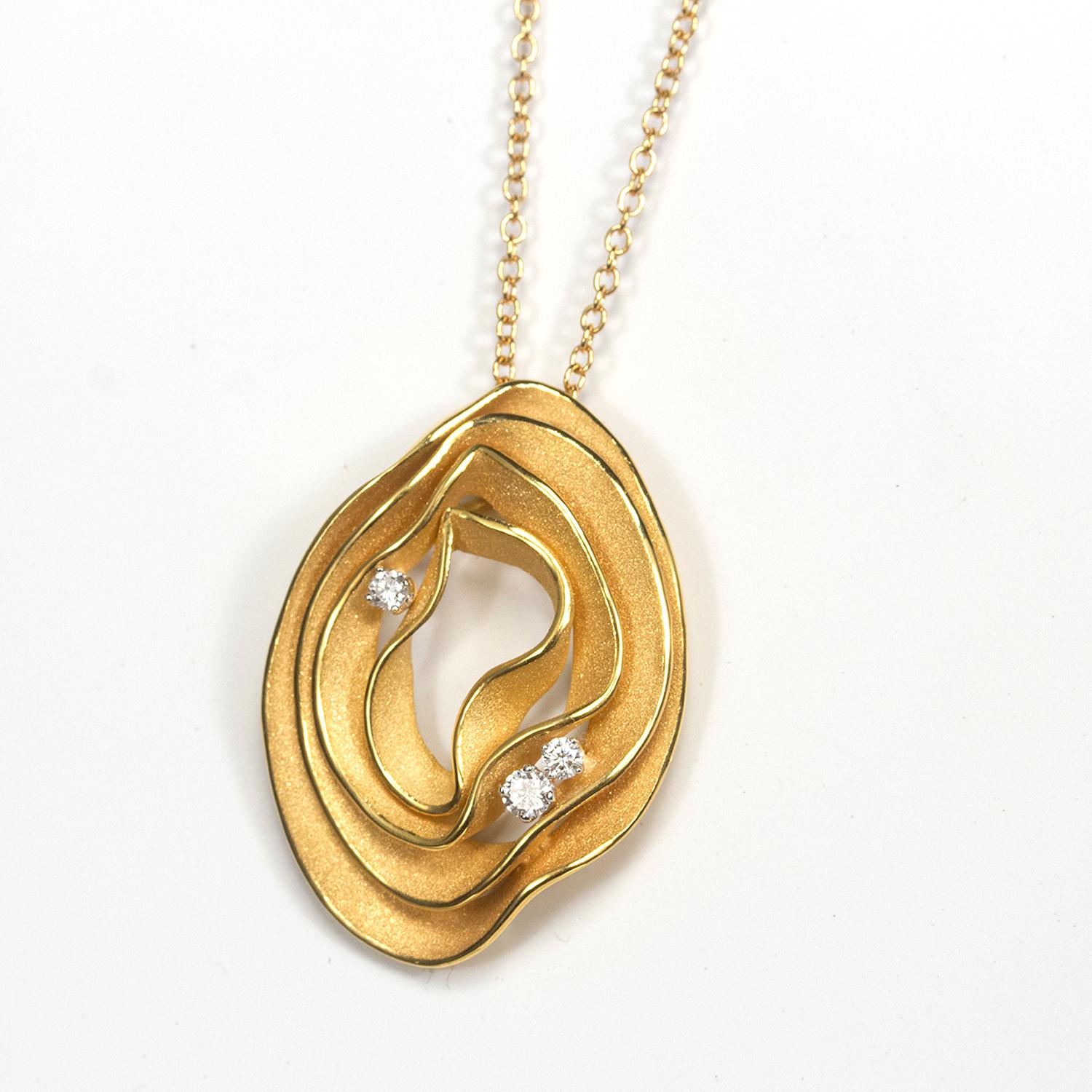 From Annamaria Cammilli's Dune Electa collection, pendant necklace handcrafted in 18 karat Apricot Orange gold. Four layers of polished and satin textured gold, with three diamonds nested between layers. Diamond total weight is 0.16 carat. Pendant