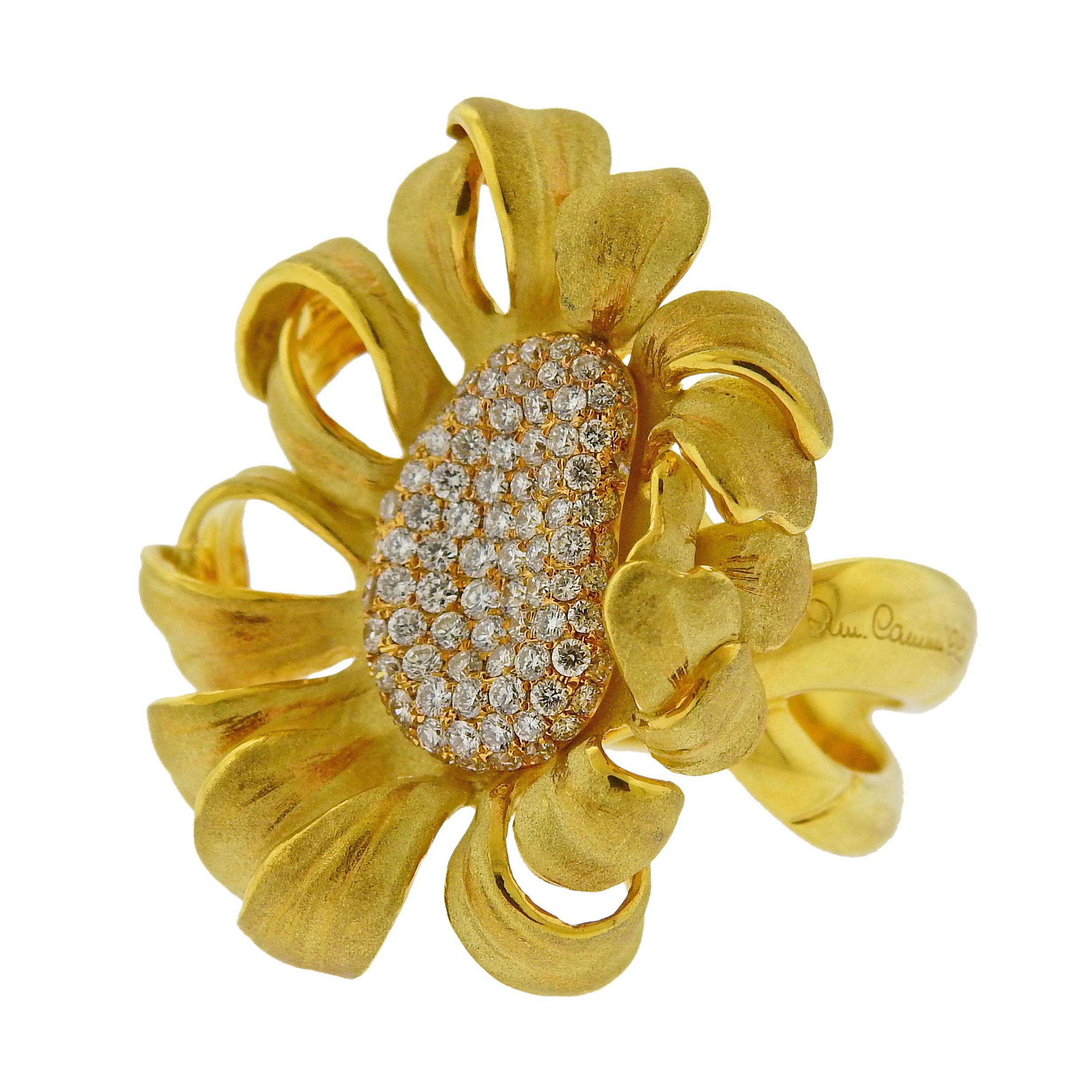 Pair of brand new 18k yellow gold Mirage large flower ring, by Italian designer Annamria Cammilli, set with 0.92ctw in GH/VS diamonds. Comes with box and COA, retail $9410. Ring size - 7.5, ring top - 31mm x 26mm. Weight is 17 grams. Marked: 750,