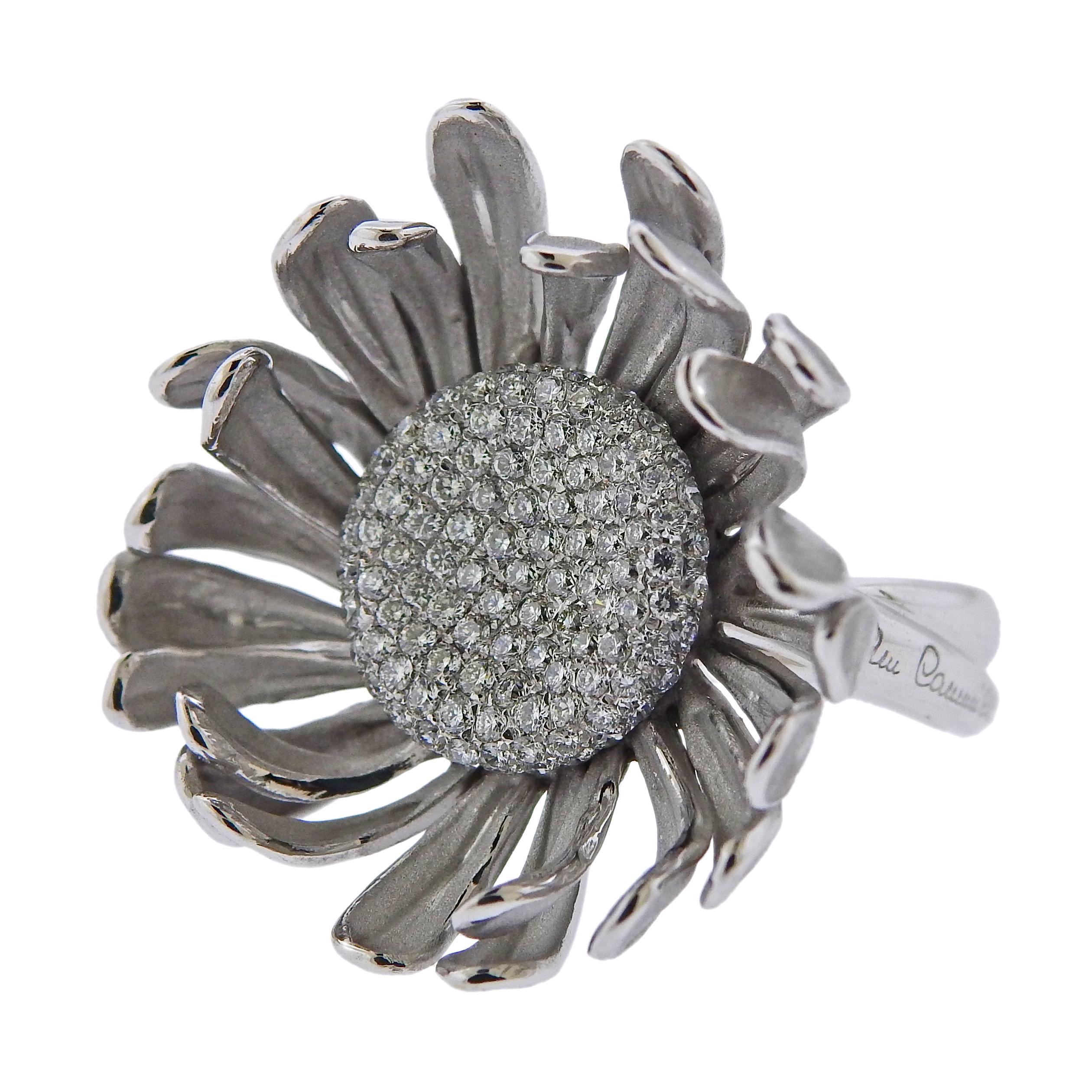 Pair of brand new 18k white gold Prelude large flower ring, by Italian designer Annamria Cammilli, set with 0.99ctw in GH/VS diamonds. Comes with box and COA, retail $9970. Ring size is 7, ring top - 30mm in diameter. Weight is 13.7 grams. Marked: