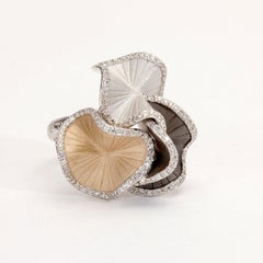 Anello "Sultana" di Annamaria Cammilli con diamanti in tre colori d'oro 18 carati