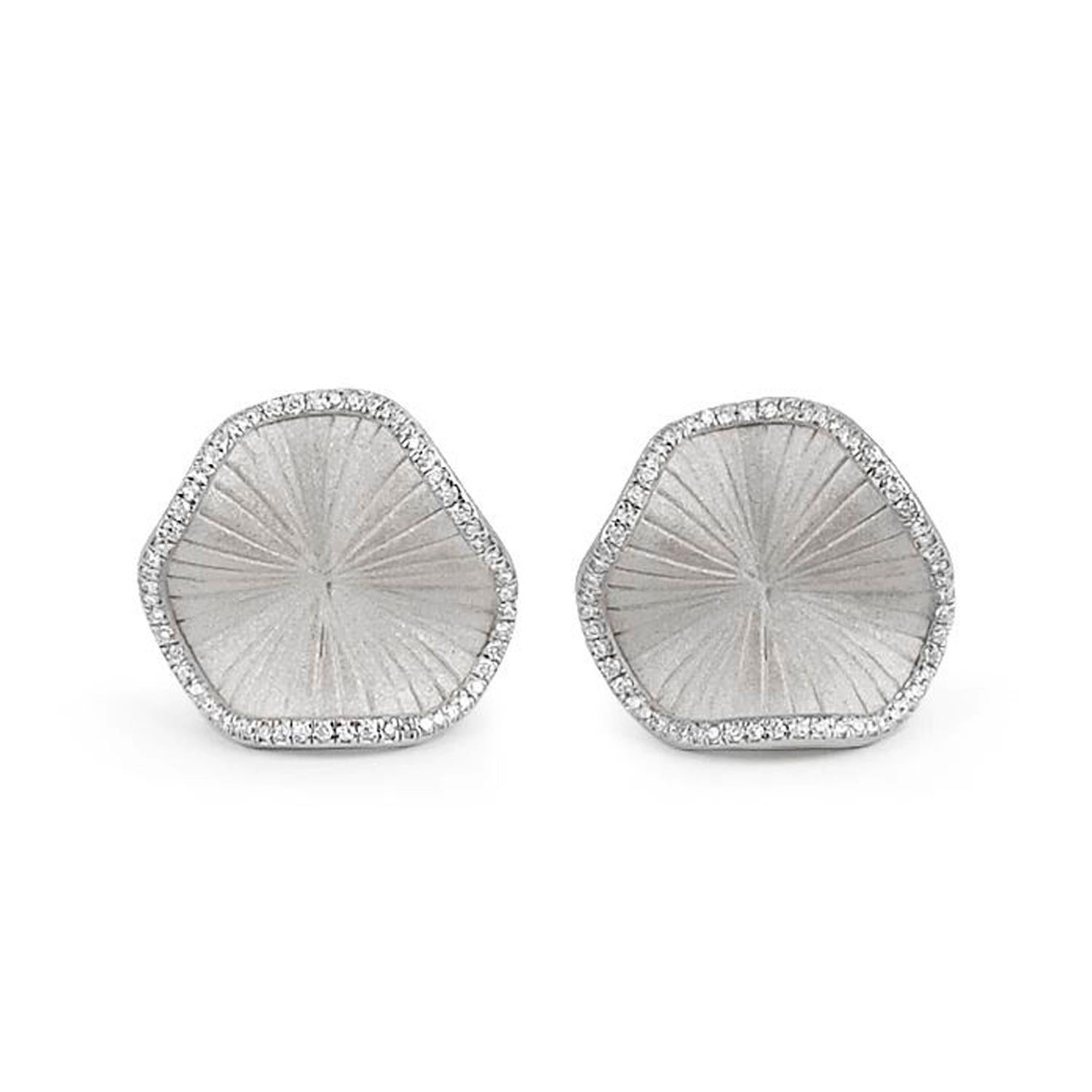 From Annamaria Cammilli's Vision collection, Sultana earrings handcrafted in 18 karat white gold. Single ruffle style is outlined with bead set white diamonds at 0.36 carat total weight. 

Sculpted in Florence, Italy, the Annamaria Cammilli brand is