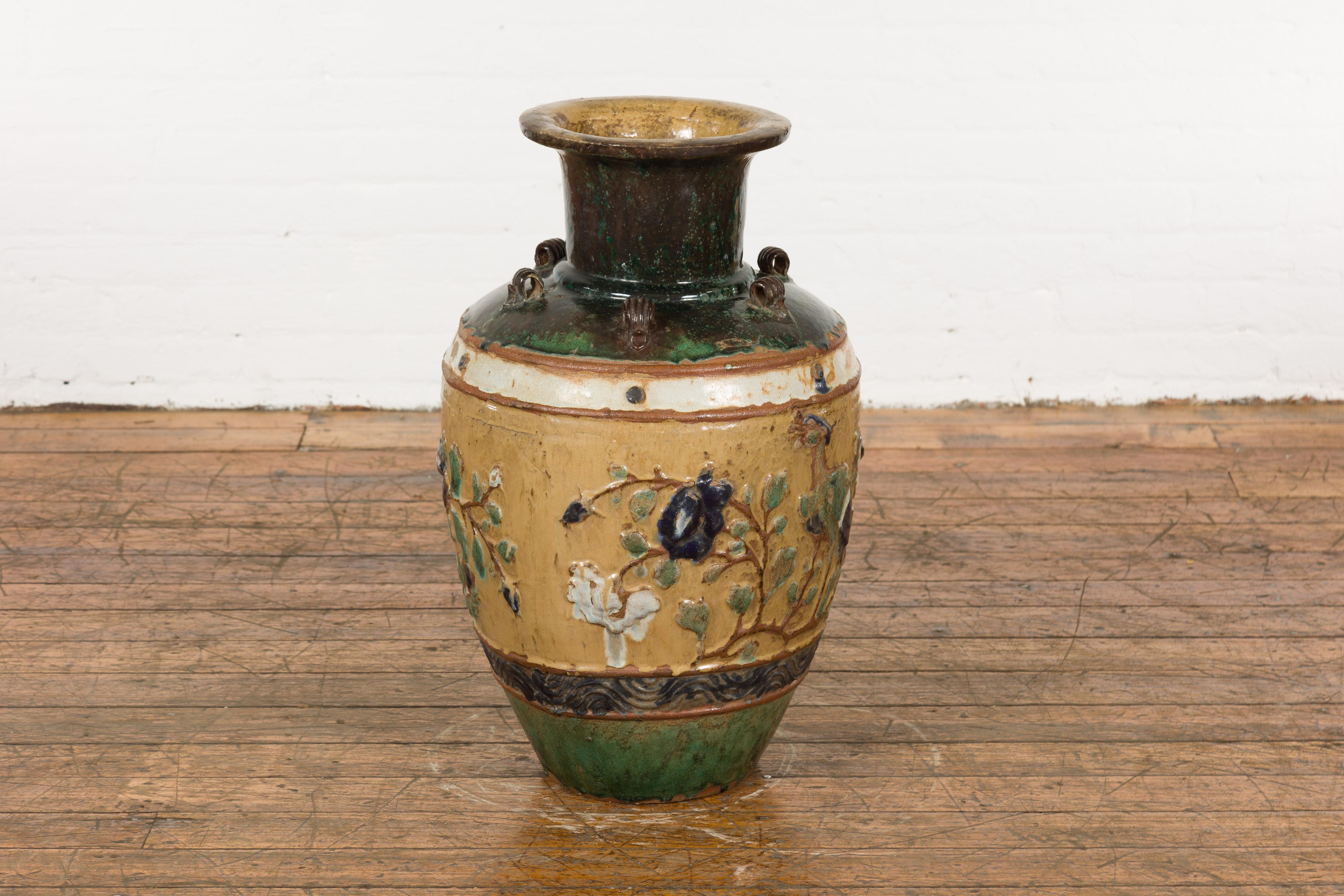 Vietnamese Annamese 19th Century Multicolor Glazed Water Jar with Raised Peacock Motif For Sale