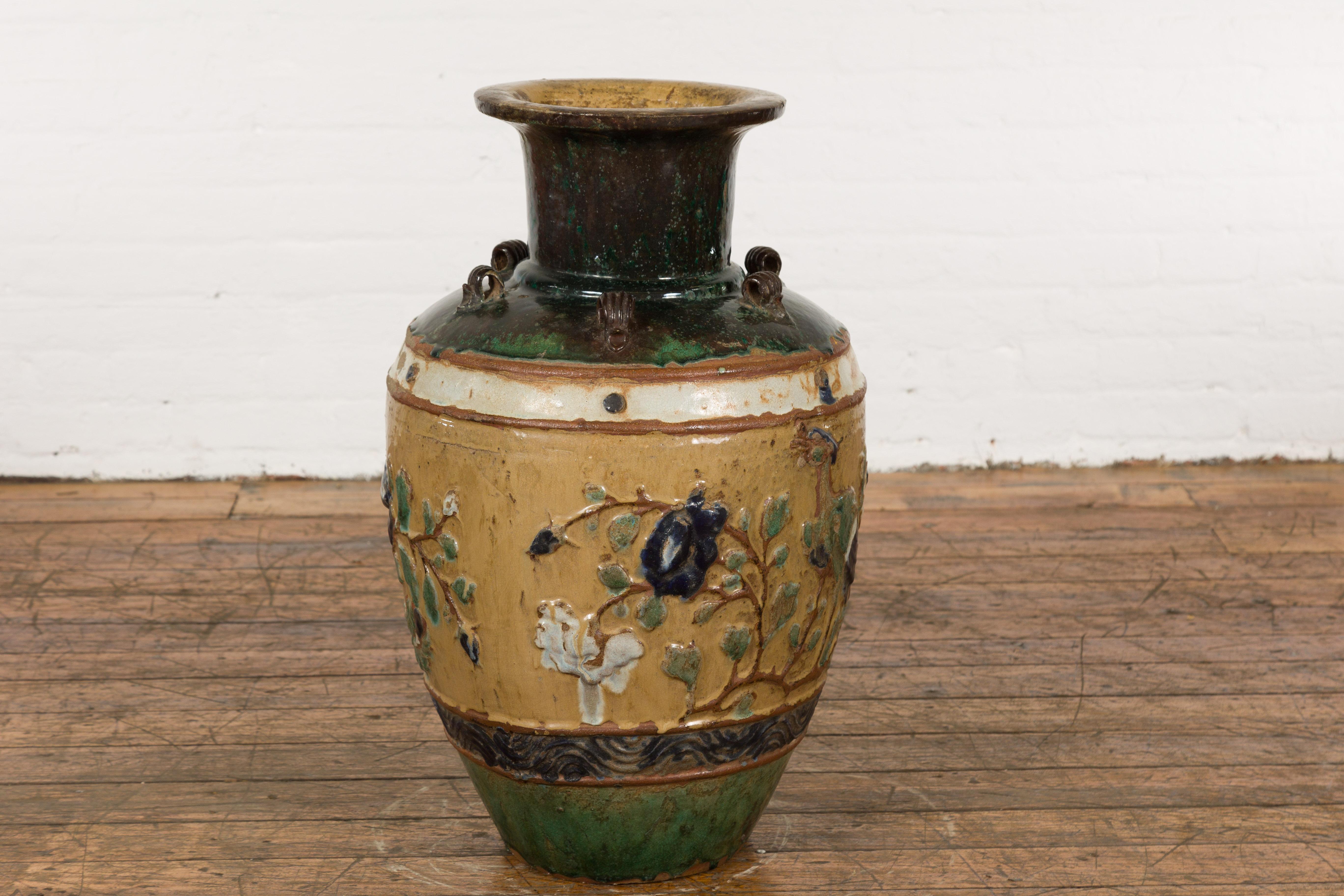Ceramic Annamese 19th Century Multicolor Glazed Water Jar with Raised Peacock Motif For Sale