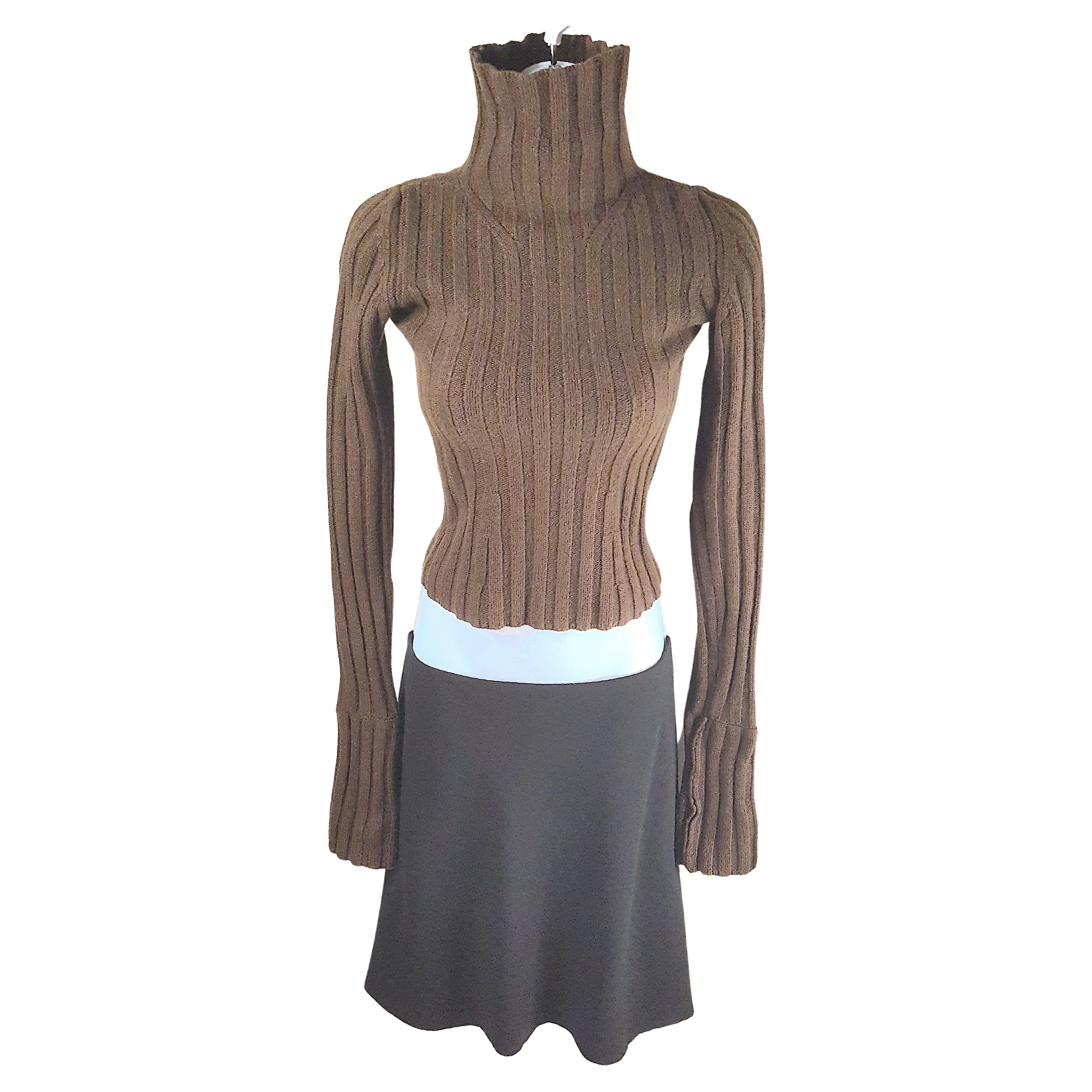 Like a turtleneck ensemble acquired by TheMet Costume Institute, Ann Demeulemeester designed this bold-silhouette contrasting-texture wool set of chocolate ribbed high-neck cropped tight knit sweater and black bias-cut crepe mini skirt for her