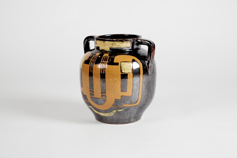 Produced at the Moly-Sabata artists' collective, this two-handled ceramic jug takes cues from antiquity, paying homage to classical heritage in form and palette. The design may reflect the influence of Albert Gleizes, an important mentor to Dangar,