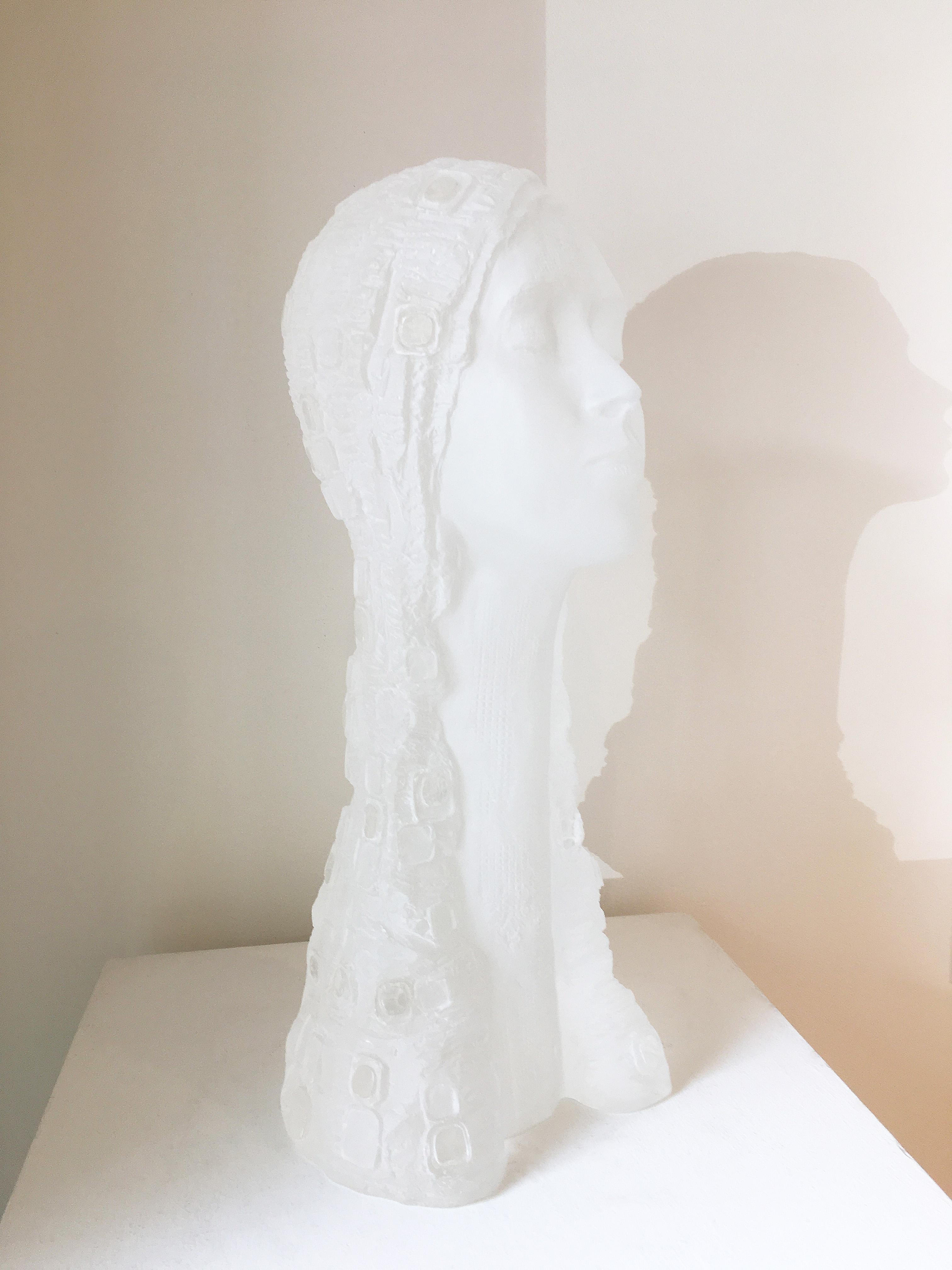 'Dreamer' by Parisian born artist Anne De Villeméjane, 2019. Acrylic, Ed. 3 of 8, 20 x 8 x 7 in. This transparent acrylic sculpture depicts a female bust showcasing a head, neck, and long hair.  Villeméjane takes her viewers into her poetic world