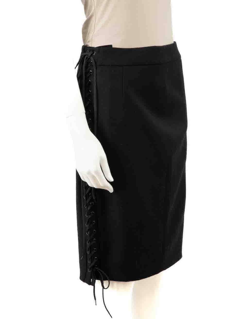 CONDITION is Very good. Minimal wear to skirt is evident. Minimal wear to the rear waistband with a small pluck to the weave on this used Anne Fontaine designer resale item.
 
 Details
 Black
 Wool
 Pencil skirt
 Figure hugging fit
 Back lace up