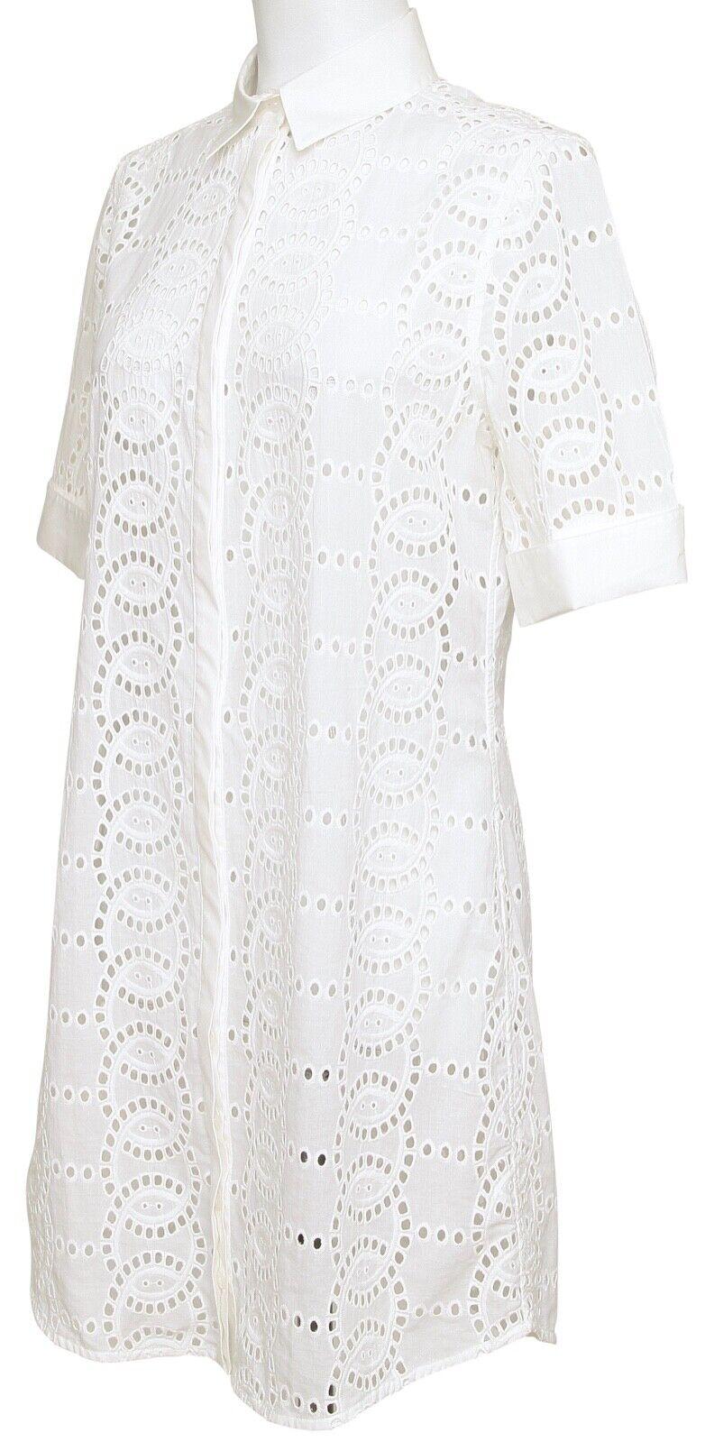 
GUARANTEED AUTHENTIC ANNE FONTAINE WHITE EYELET SHIRT DRESS


Design:
- Fresh white shirt style dress, eyelet design.
- Front covered button closure.
- Pointed collar.
- Short sleeves with button closure.
- Unlined.

Size: 40

Measurements