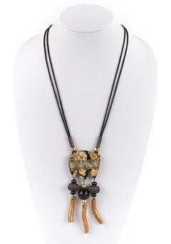 Anne & Frank Vigneri - Collana con ciondolo in lucite con perline in oro nero e metallizzato