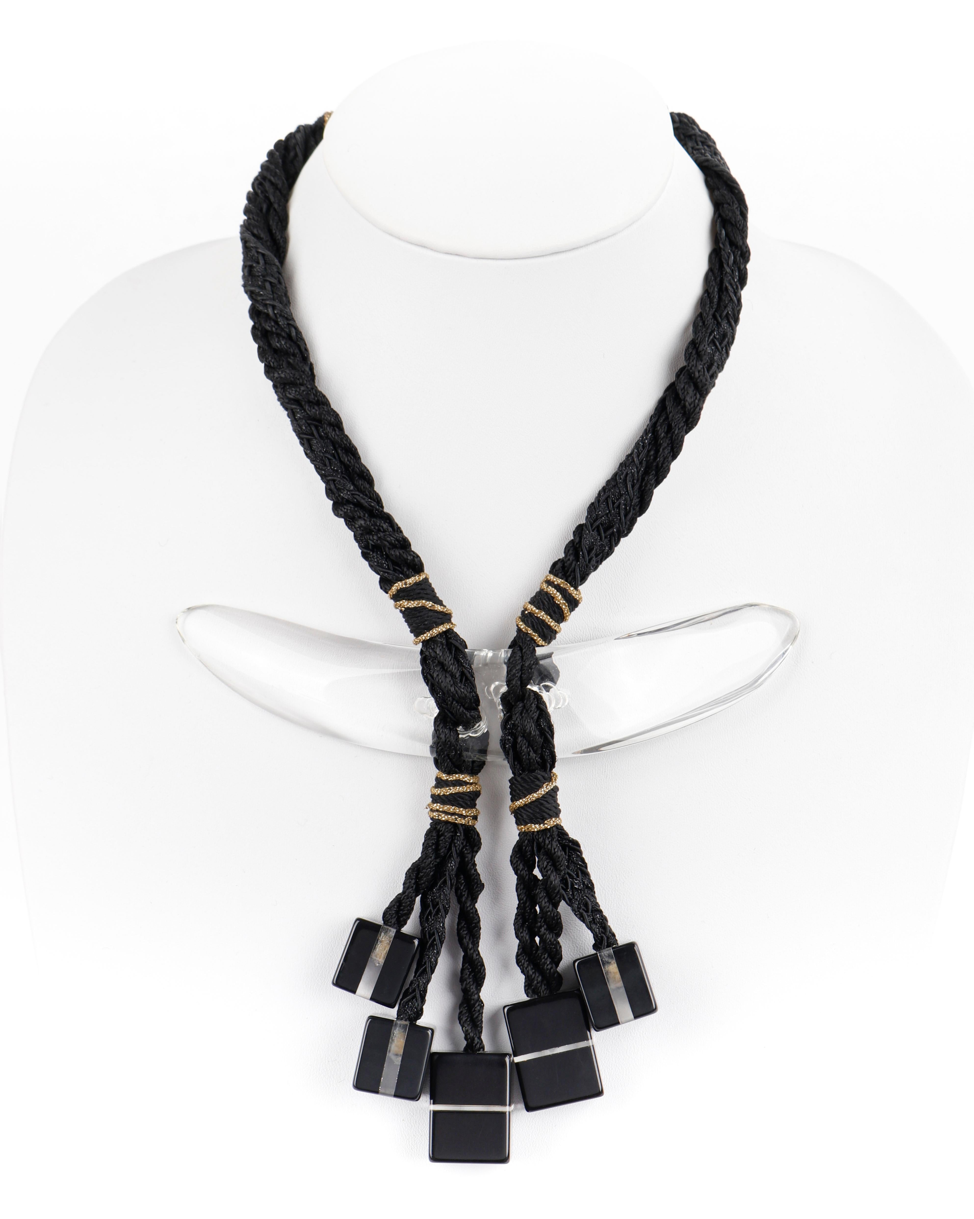 ANNE & FRANK VIGNERI c.1981 Black Clear Lucite Block Rope Necklace Numbered

Brand / Manufacturer: Anne & Frank Vigneri
Circa: 1981
Style: Rope necklace
Color(s): Shades of black and gold (rope); black, clear (lucite)
Unmarked Material (feel of):