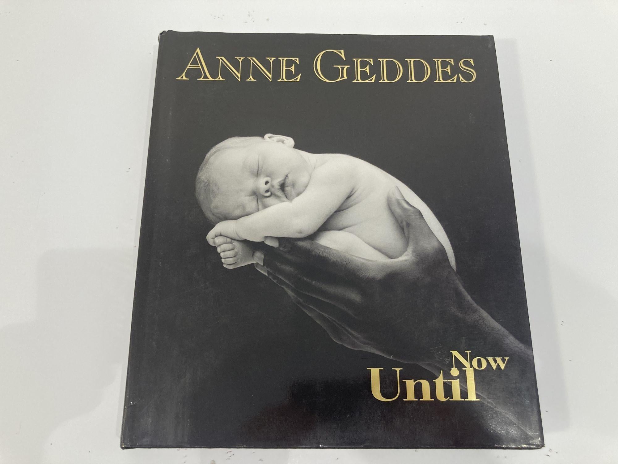 Anne Geddes Until Now Photofolio.
Large heavy coffee table hardcover book.
Anne Geddes is the world's bestselling photographer. UNTIL NOW was a major retrospective of ten years of her work featuring all her best-known images together with many