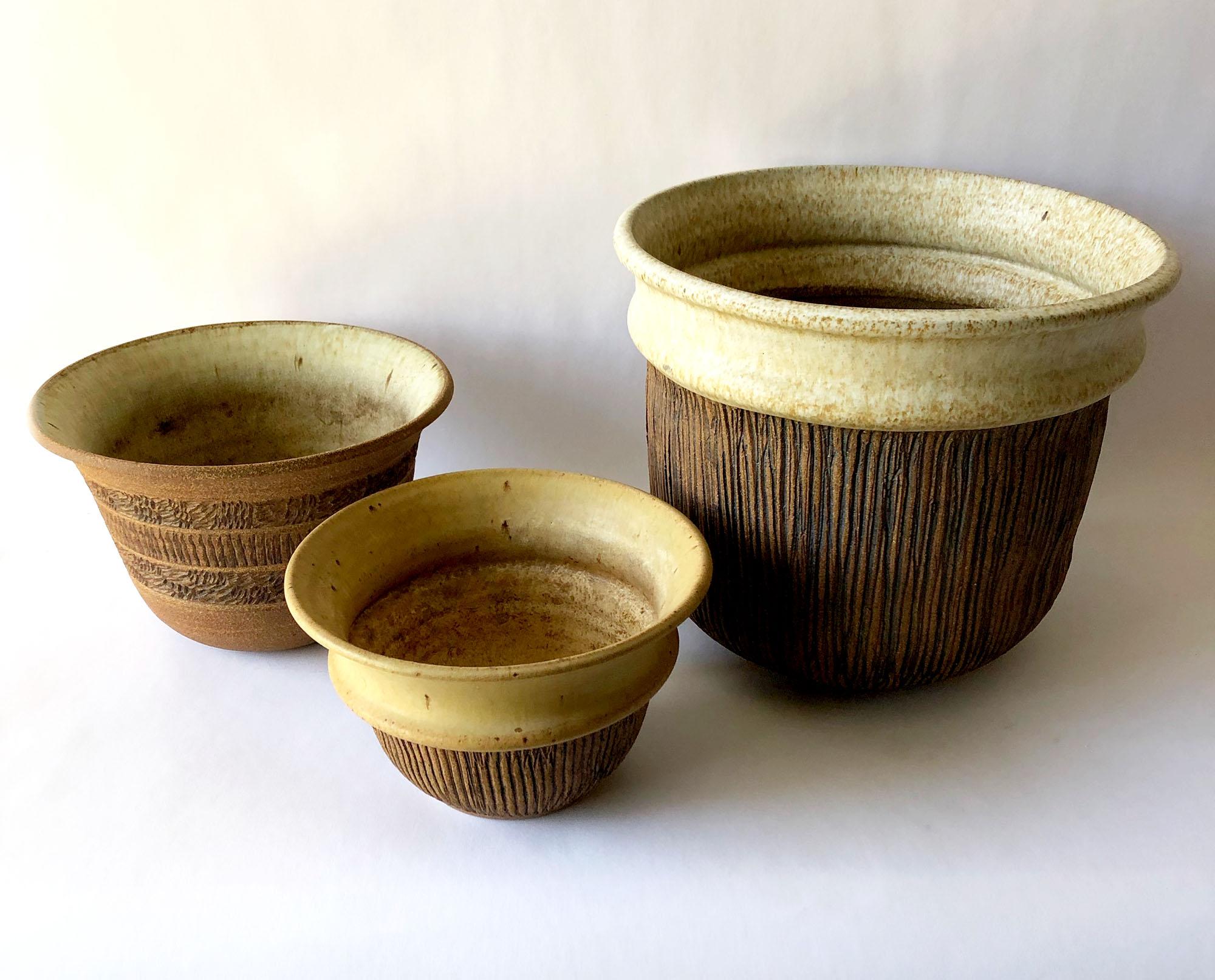 Handmade trio of planters created by Anne Goldman of California. Large planter measures 11.5