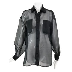 Anne Klein - Camicetta a maniche lunghe con doppia tasca in organza di seta nera anni '70