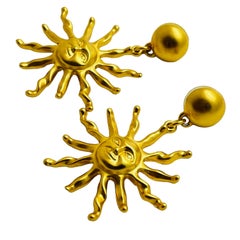 ANNE KLEIN sun face matte gold tone designer dangle earrings